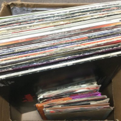A box and a record case of LPs and 7" singles by various artists including The Stranglers, Queen, Meatloaf and others. Shipping category D.