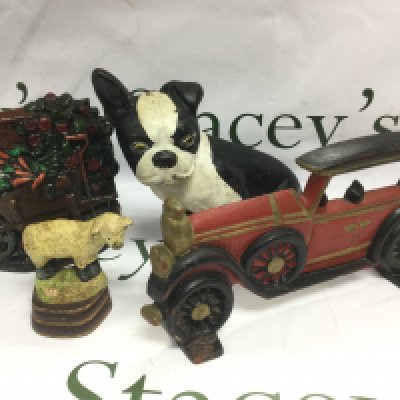 Four cast iron figural doorstops. Shipping category D.