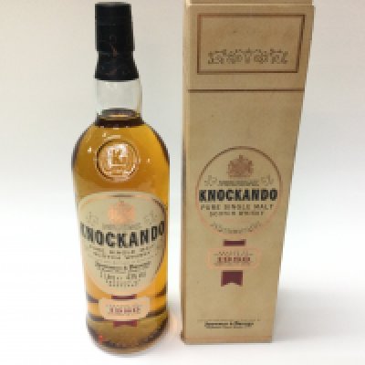 A bottle of Knockando 1980 single malt. Sealed with box. 1 litre.