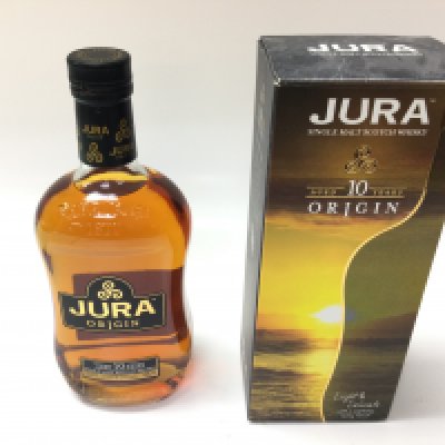 A bottle of Jura 10 years single malt whisky. 700ml sealed and boxed.