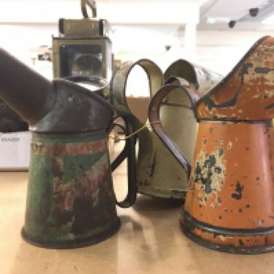 4 small quarter pint vintage oil jugs , all original. postage cat B