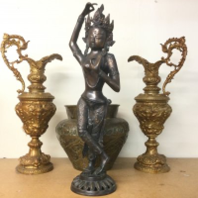 A large bronzed Tibetan figure, approx height 66cm, a pair of ewers and a mixed metal vase. Shipping category D.