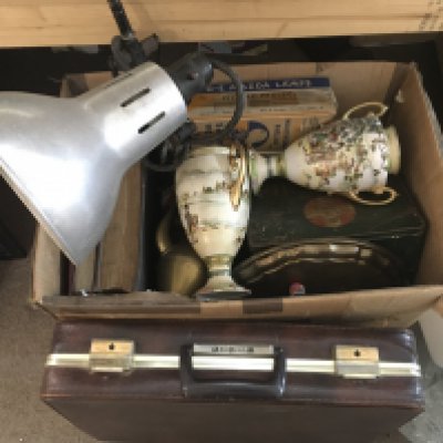 Assorted oddments including a projector, bulbs, briefcase with toys, documents. This lot cannot be posted