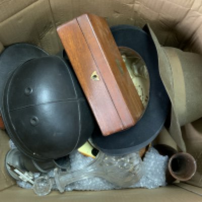 A box of various odds to include a driving helmet, ceramic, pewter etc.