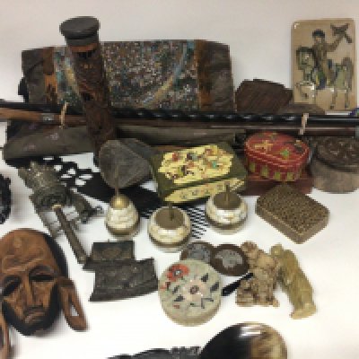A collection of treen items and other intresting oddments two flint strikes walking sticks an embroidery wall hanging Middle Eastern tiles and other objects.