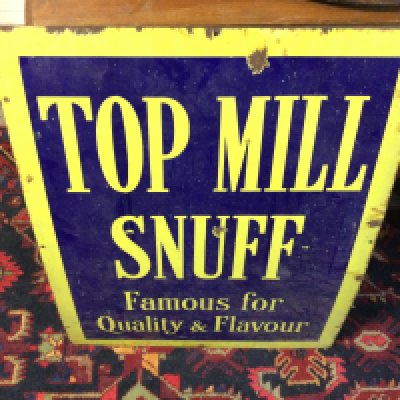 A large enamel Top Mill Snuff sign.