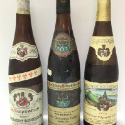 A collection of vintage German wine including a bottle of 1980 St Stephanus Rudesheimer Rosengarten, 1976 Deheimer Doktor Spatlese, 1978 Bechtheimer Pilgerpfad Kabinett. This lot cannot be posted