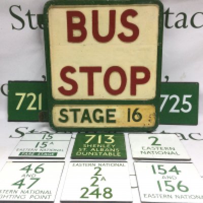 A collection of enamel bus signs plus a painted fibre glass bus stop sign. Shipping category C.