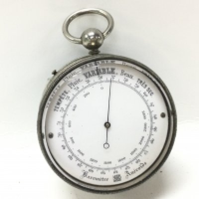 A pocket barometer (one crystal is loose and is taped on). This lot cannot be posted
