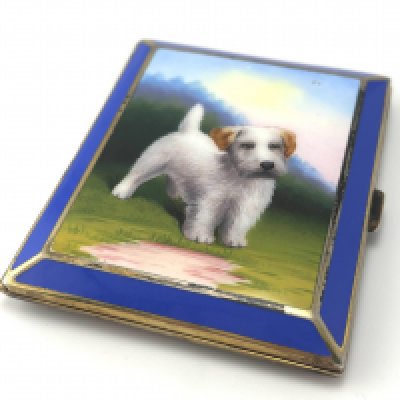 A quality early 20th century enamel cigarette case with design of a Terrier dog. Postage category A