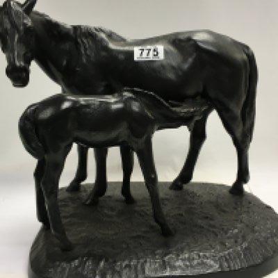 A Bronzed group in the form of horse and foal 30 cm .