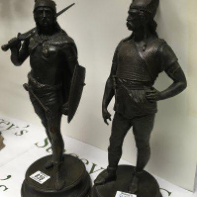 A pair of bronzed figures in the form of Roman soliders 40 cm .