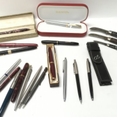 A collection of assorted pens both ballpoint and fountain including Sheaffer and Parker etc. Also some pen knives. Postage B