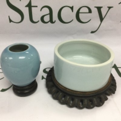 A small Oriental vase raised on a hardwood base, approx total height 8cm plus one other (2). Shipping category D.