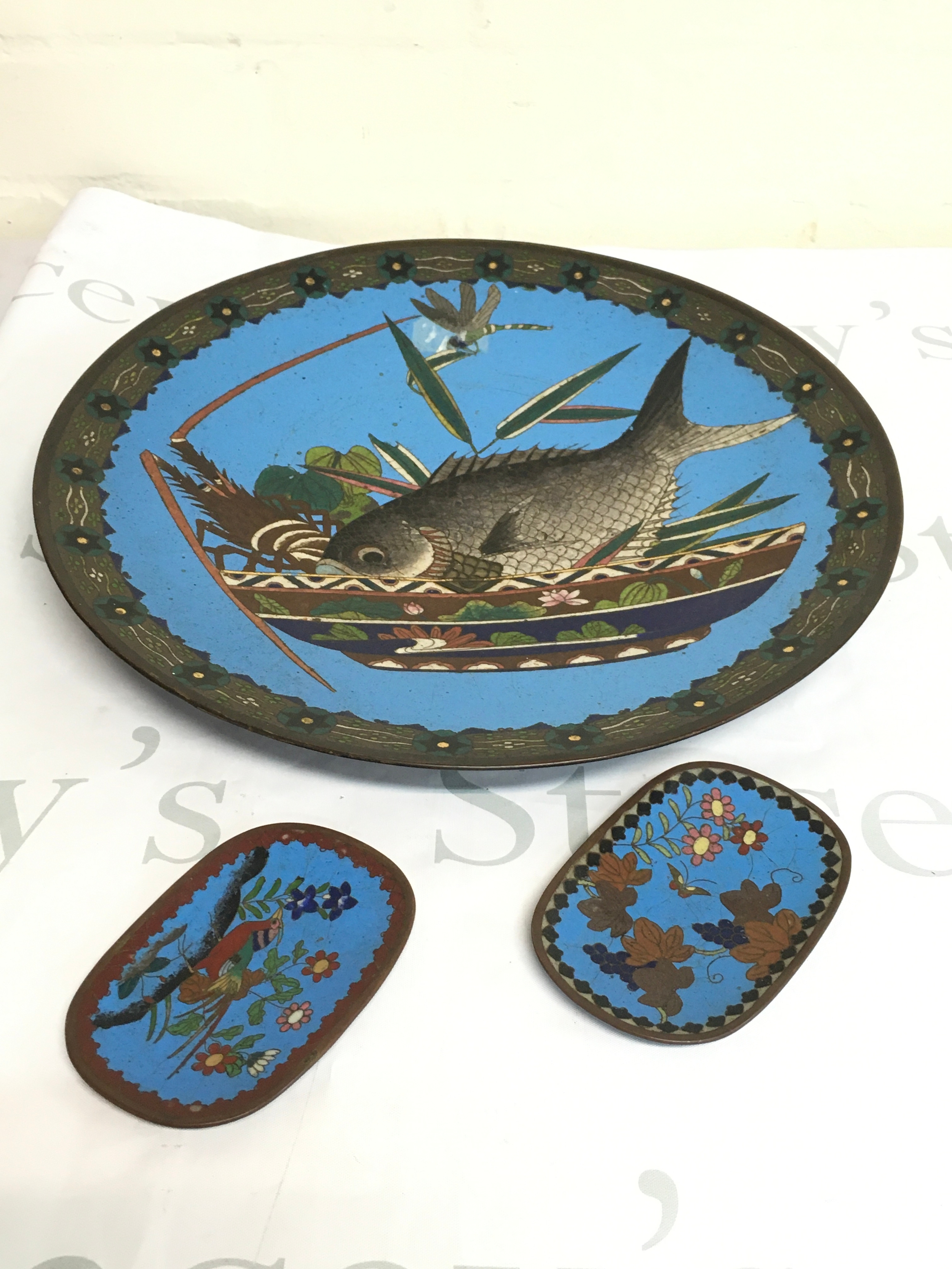 A large Japanese Cloisonné enamel dish with fish design and two small pin dishes. 38cm wide, 11cm wide 