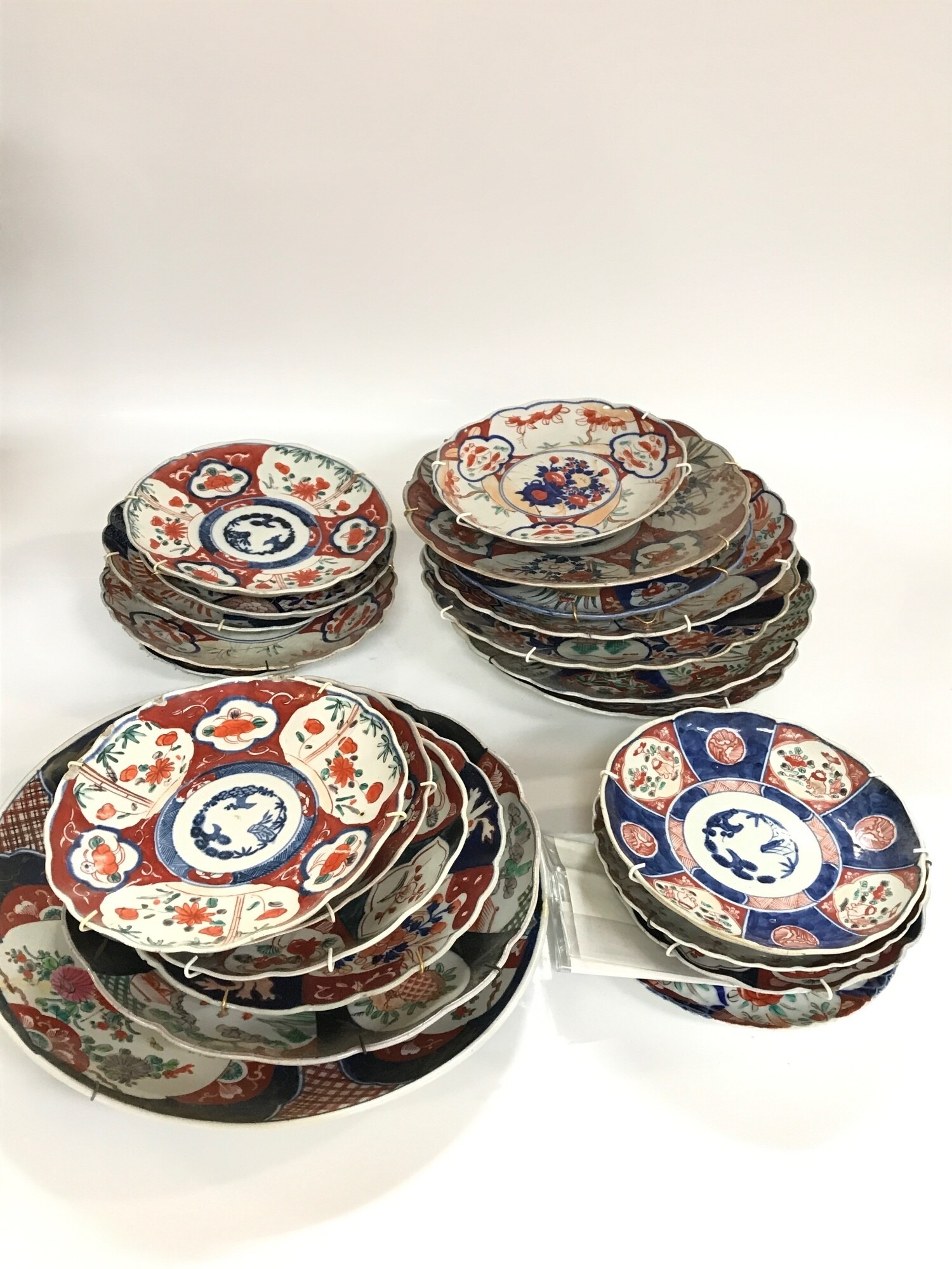 A collection of 19th century Imari plates .22 to 37cm wide