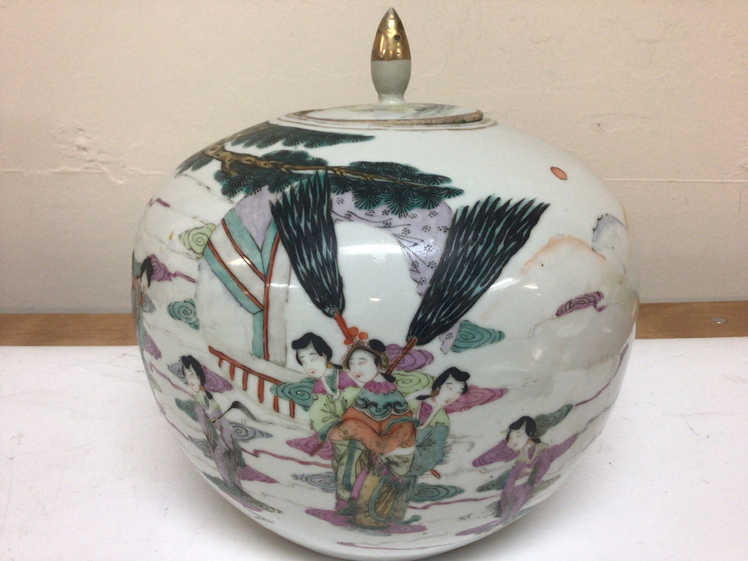  A large Chinese Republic porcelain vase with a lid decorated with figures approximately 27cm wide Hight 28cm marks to the base in red restoration to the cover. 