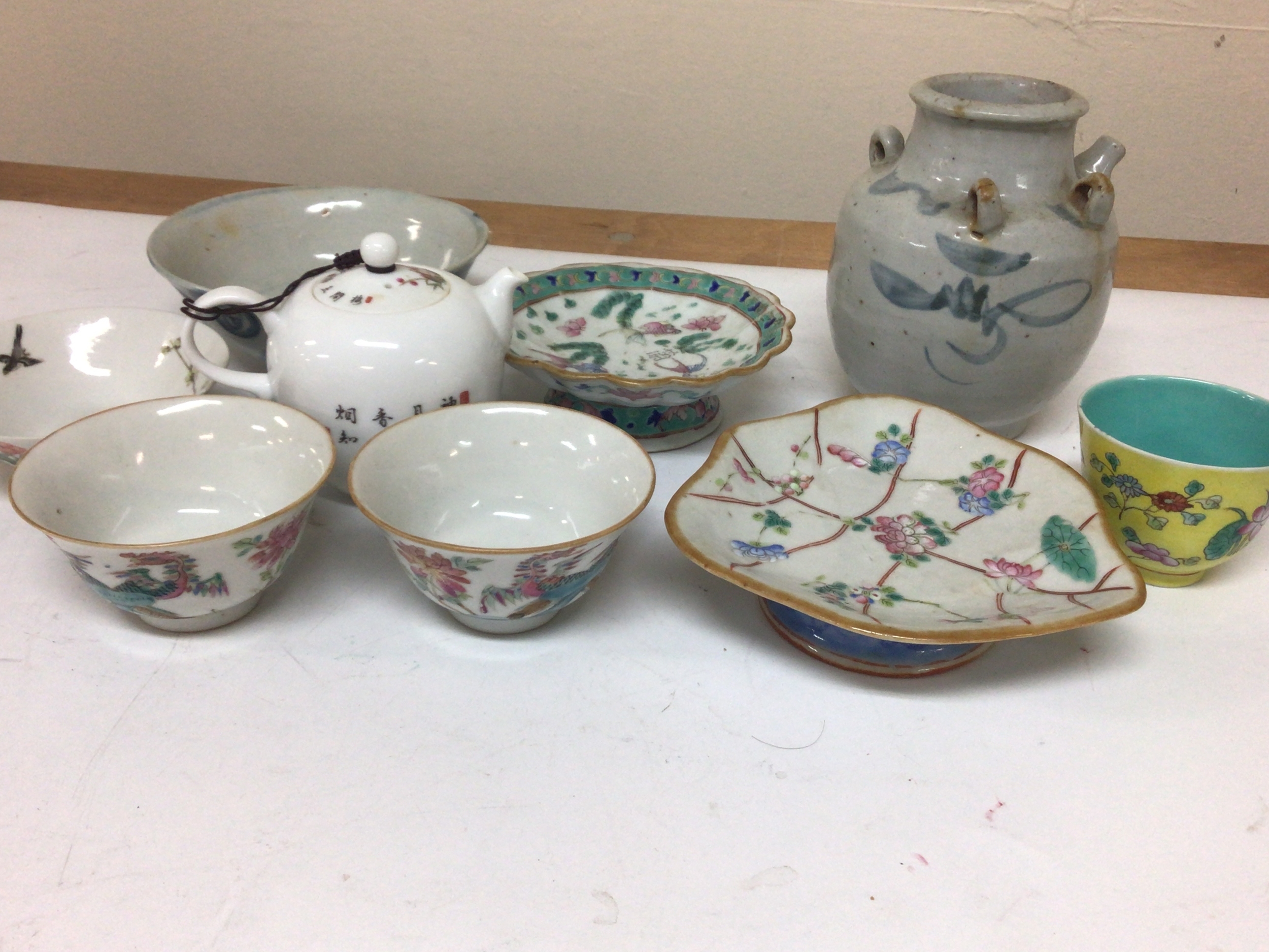  A collection of Chinese ceramics mainly Republic comprising of shaped dishes a blue and white bowl and vase polychrome decorated tea bowls a small tea pot. 