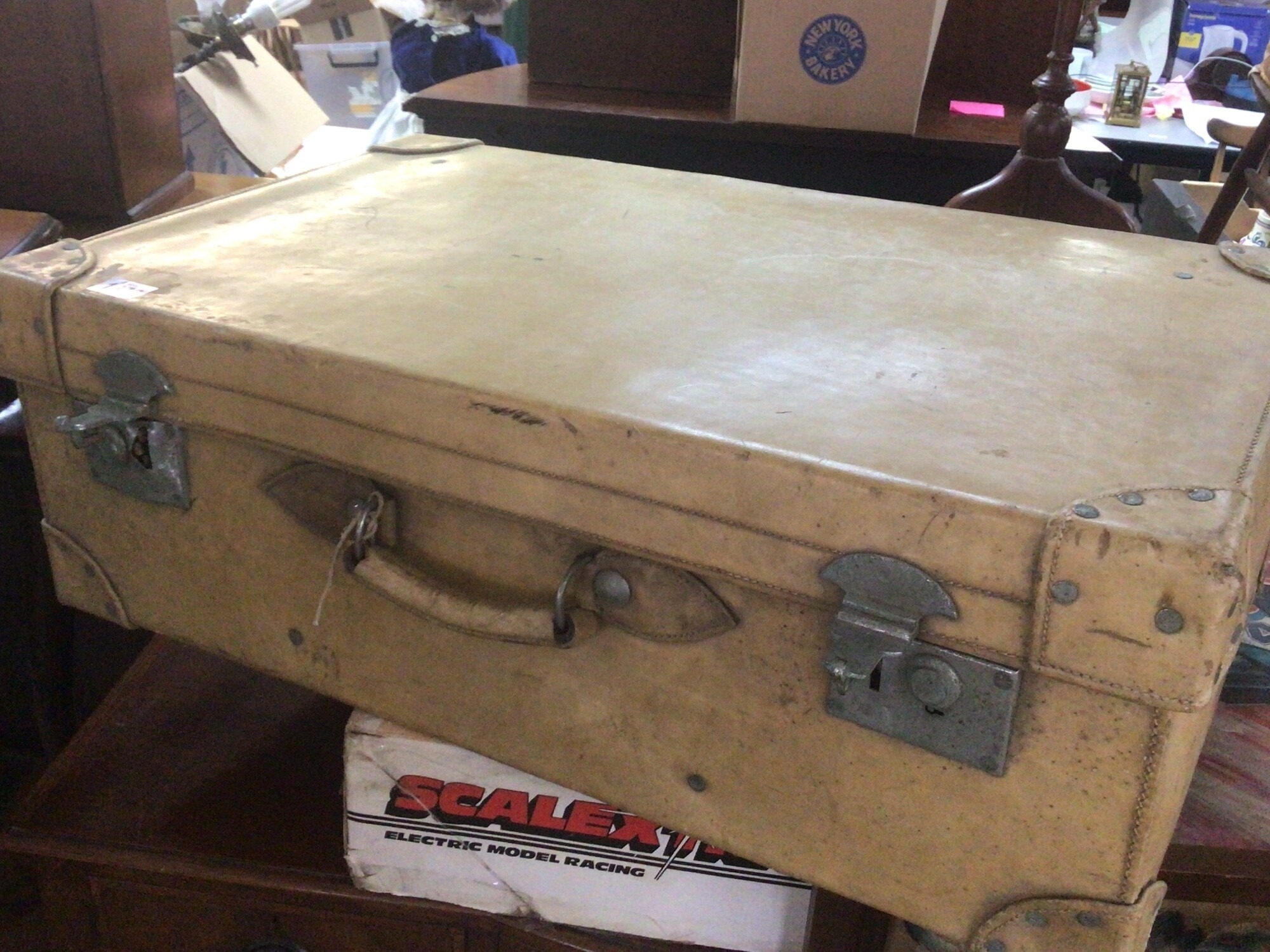 A Vintage leather light coloured case of rectangular shape 76cm long 46cm deep Hight 26cm TO BE SOLD WITHOUT RESERVE