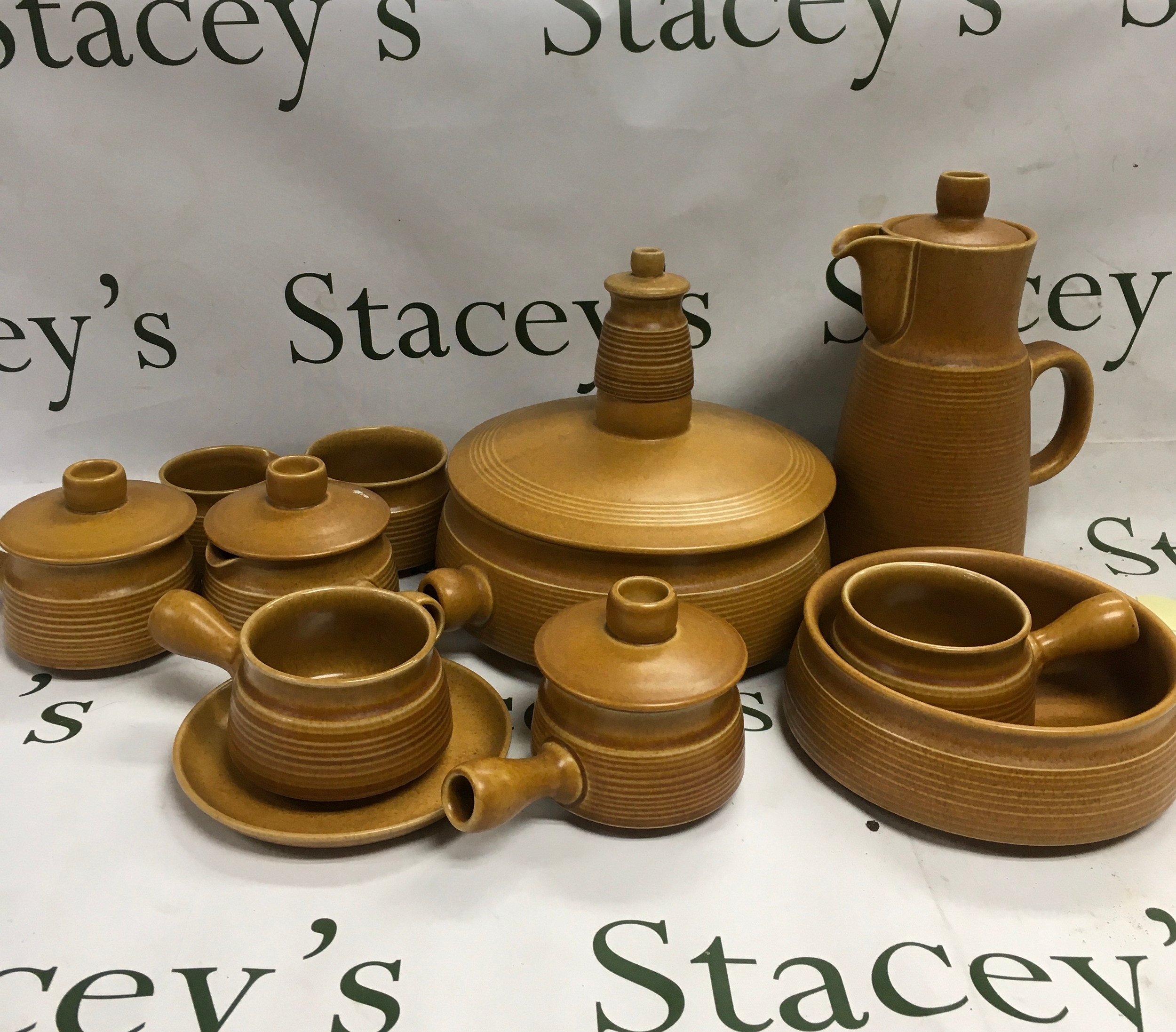 A selection of mid century 'Canterbury' pattern stoneware oven-to-tableware.