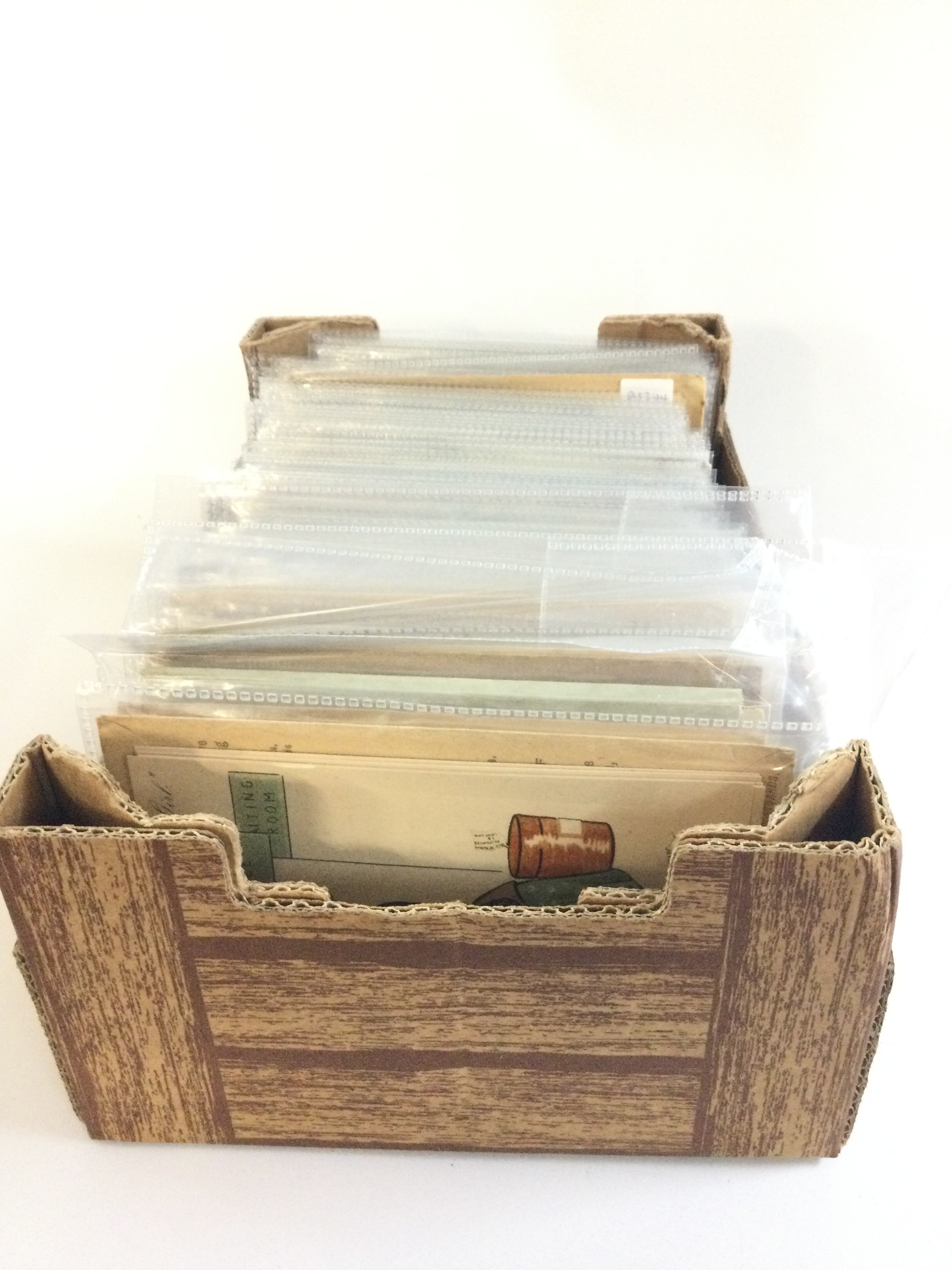 Over 75 complete Tuck post card sets including the Kings & Queen's of England sets and many with their original packets
