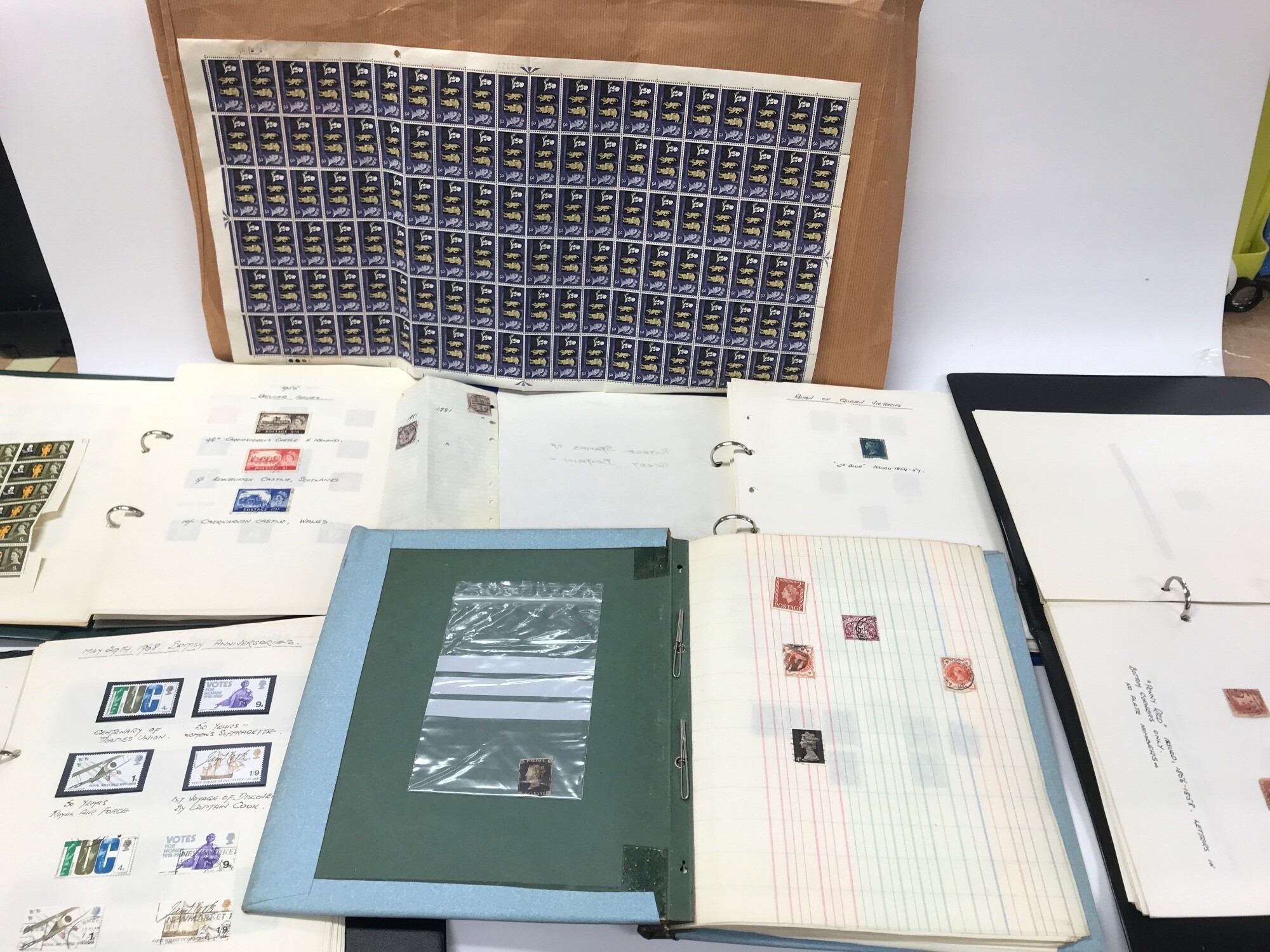 A collection of assorted GB stamps including a penny black.