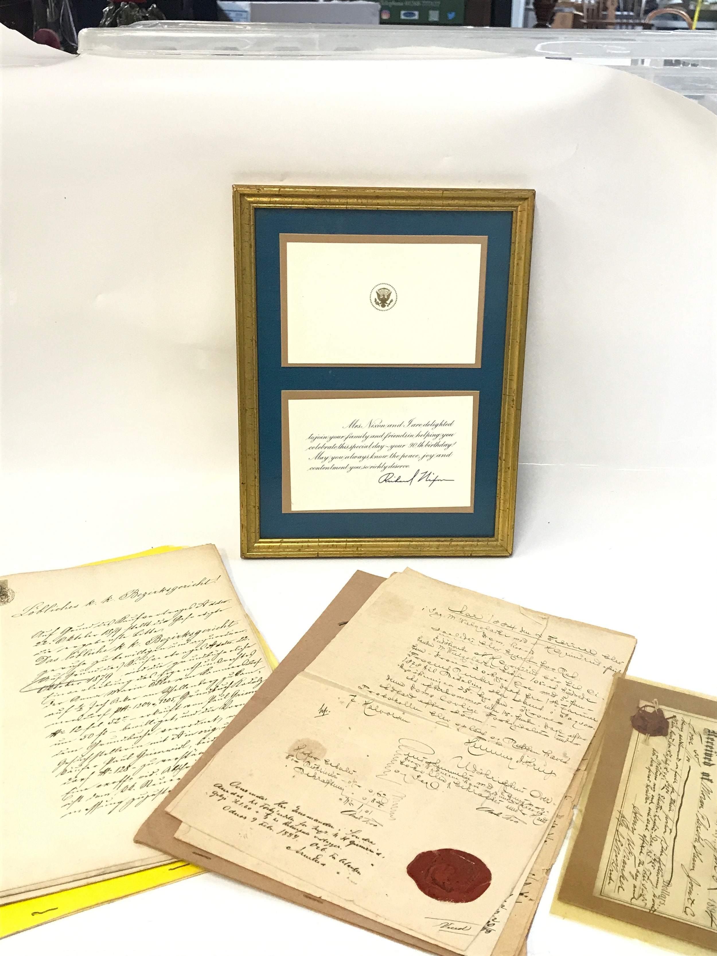 A collection of old letters, framed Richard Nixon letter 90th birthday celebration, 19th century tax documents, Jean Van Eyck book, French document dated 1780 no reserve 