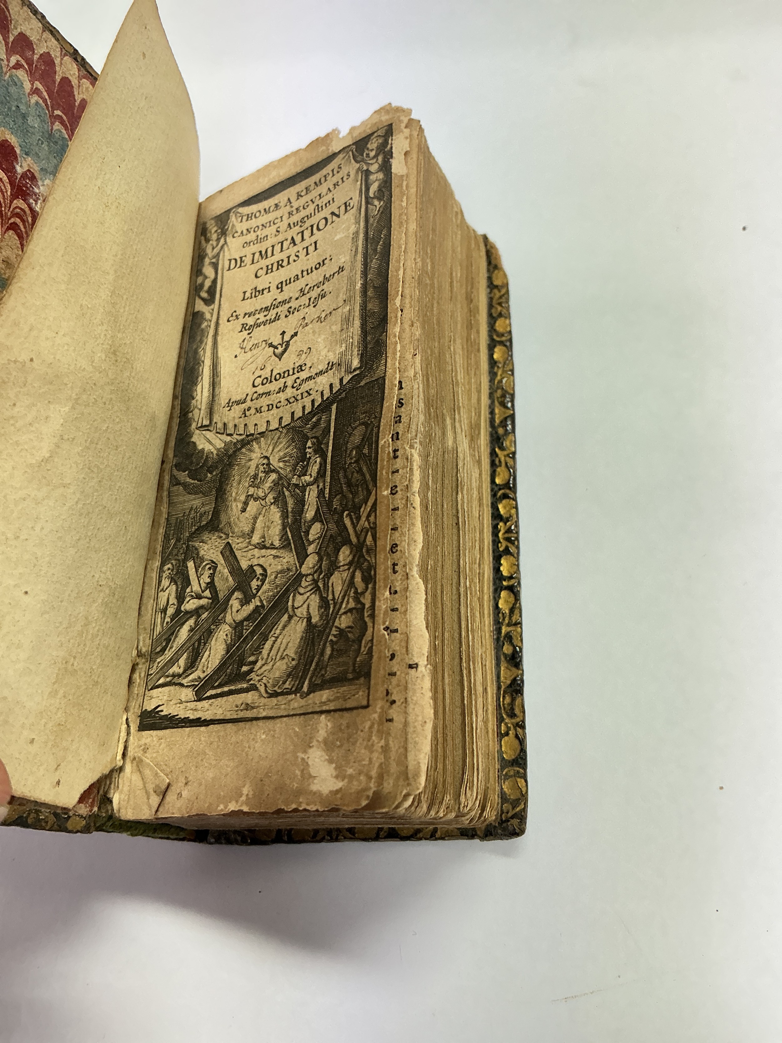 A circa 1629 The Imitation Of Christ small leather bound devotional book.
