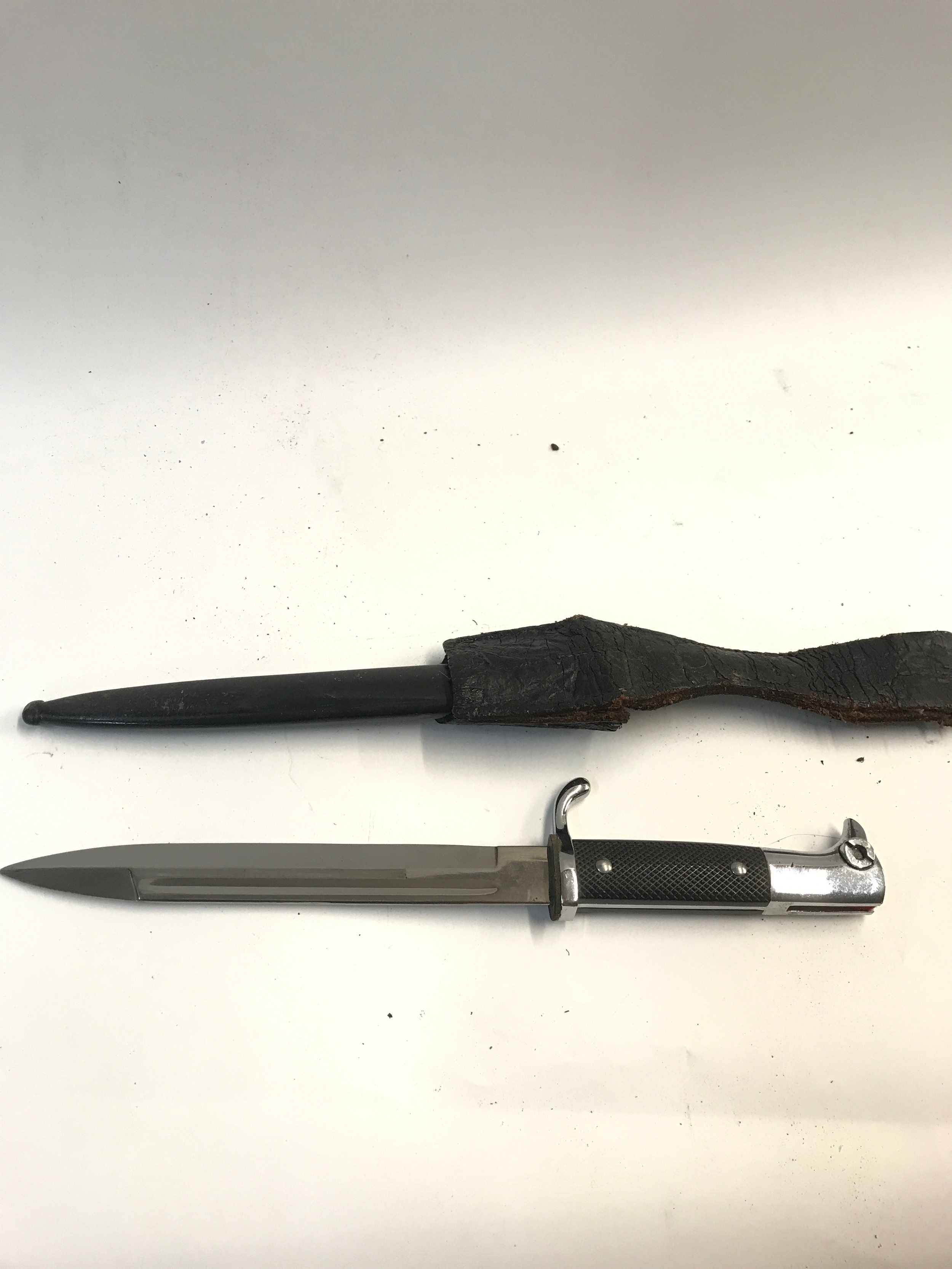 A k98 German dress bayonet and frog ( no maker ). Blade 19cm long. Total knife length 38cm
