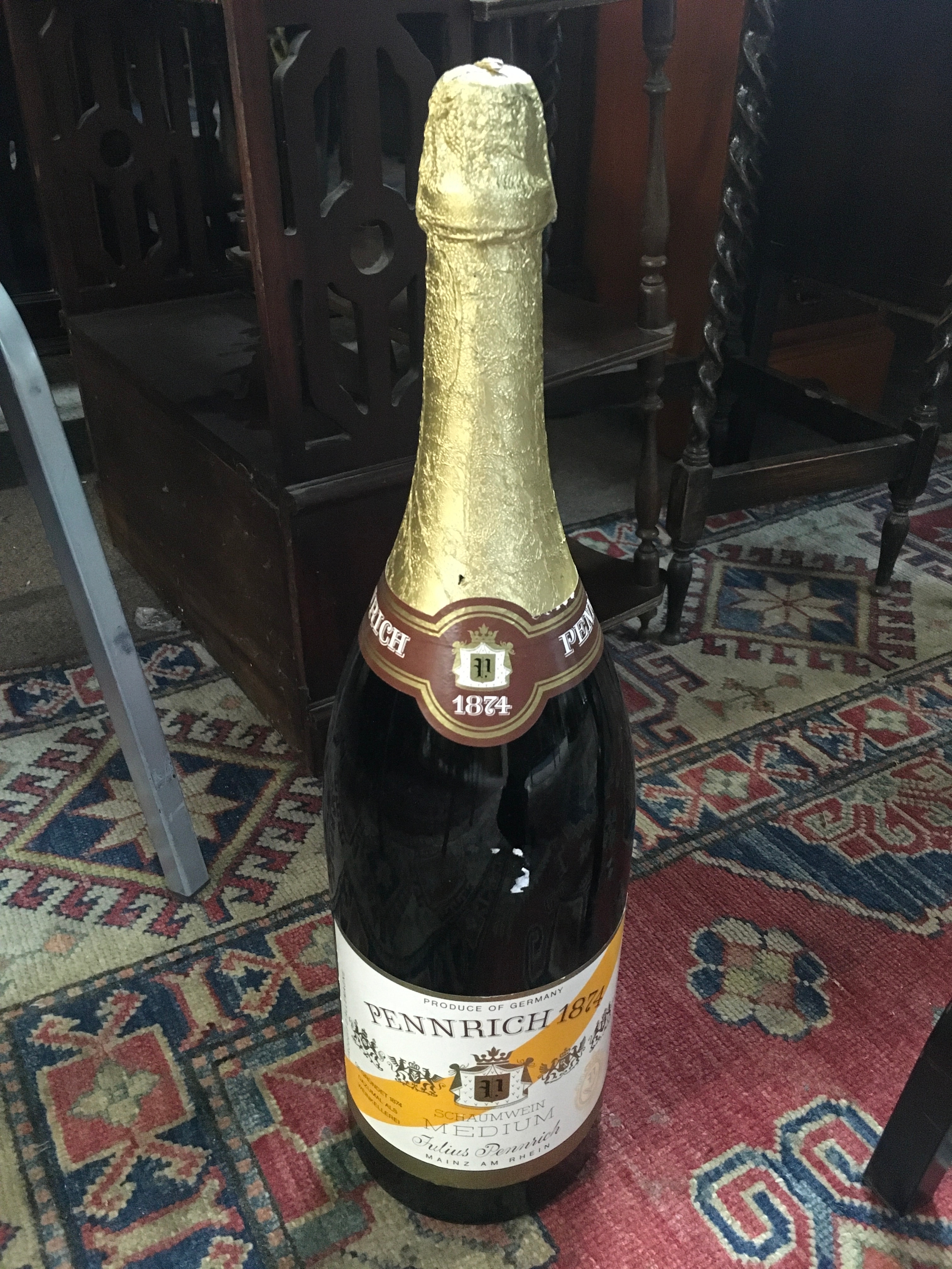 A large bottle of Pennrich 1874 German champagne. 50cm tall. No reserve