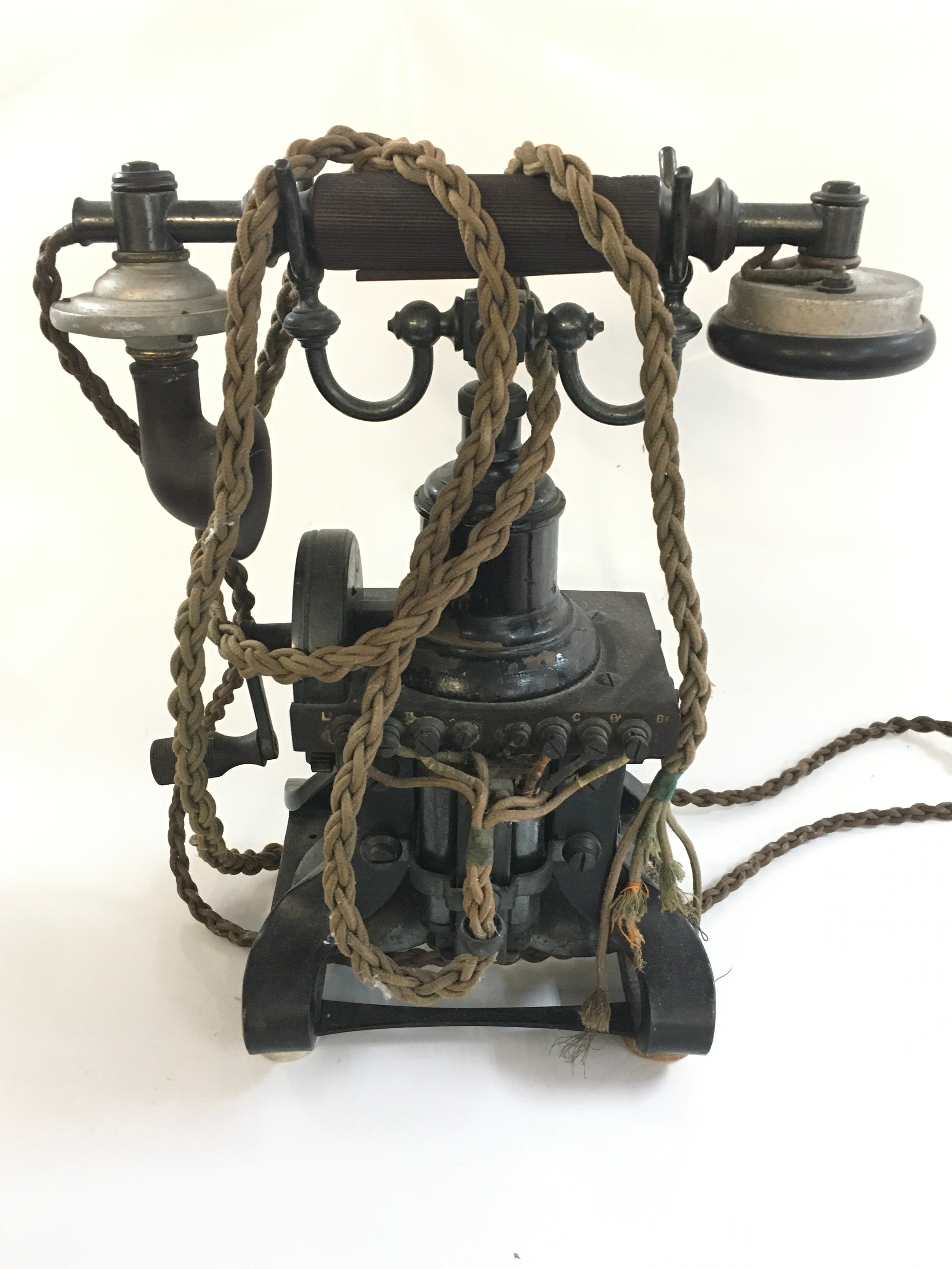 A vintage skeletal Telephone. 29cm tall