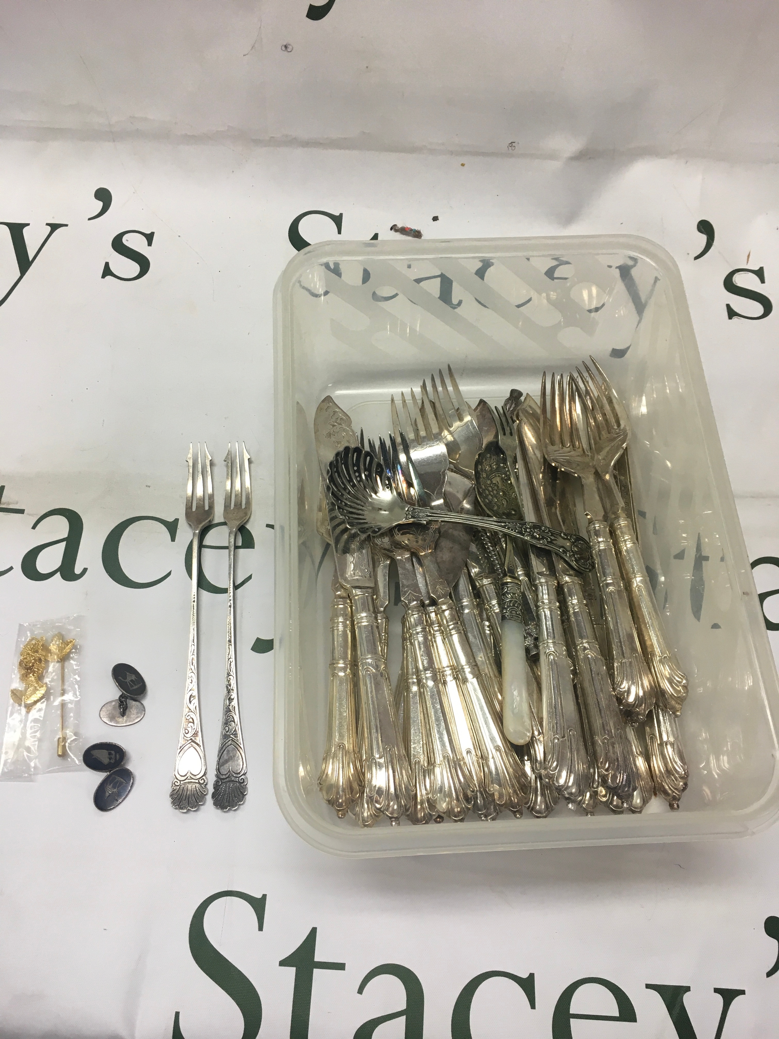 Hm silver pair of rickle forks and niello silver cufflinks along with walker and hall epns fish knives and forks.