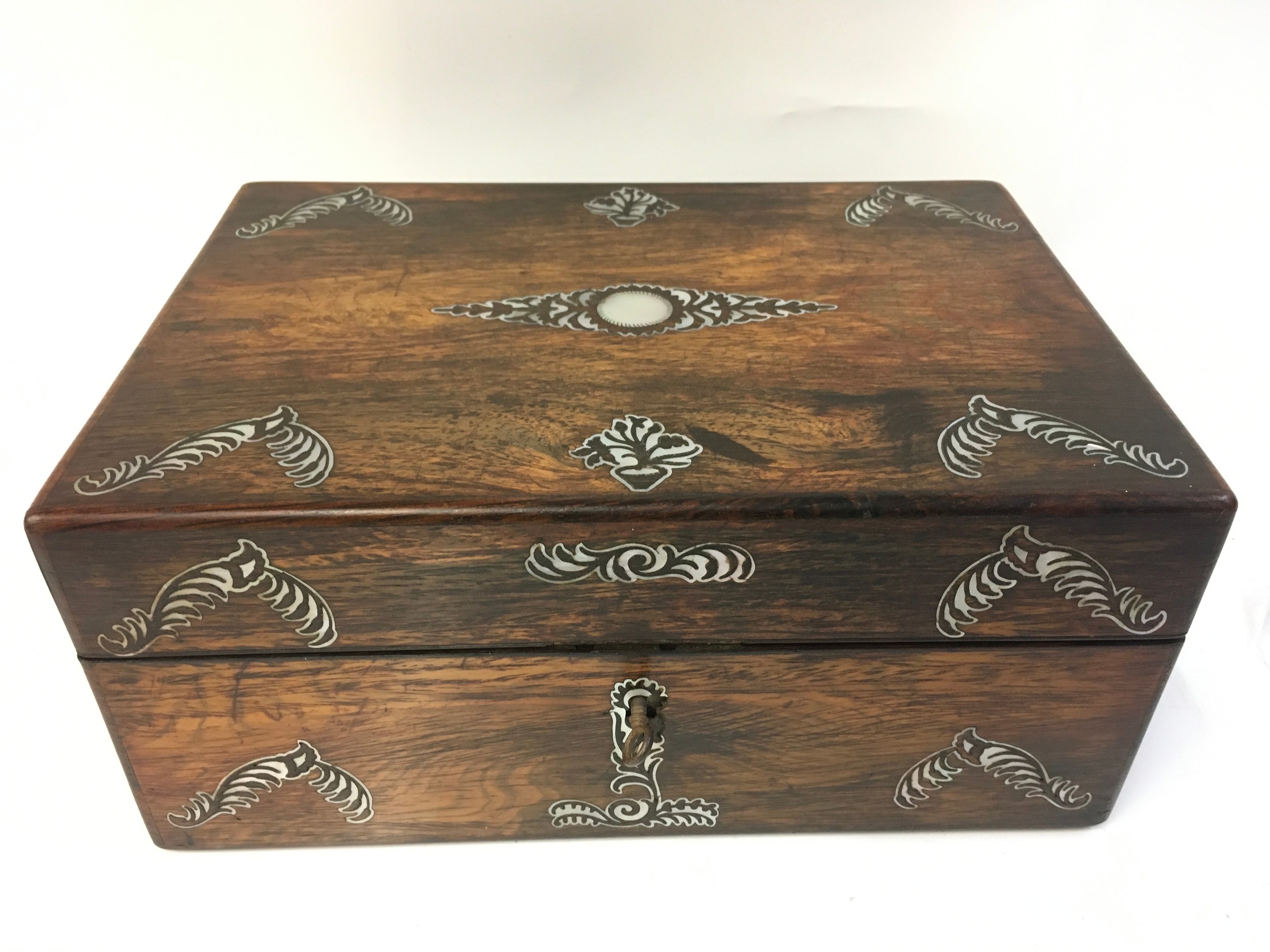 A rosewood sewing box with a fitted interior, 28cm wide ,13cm tall, 20cm long