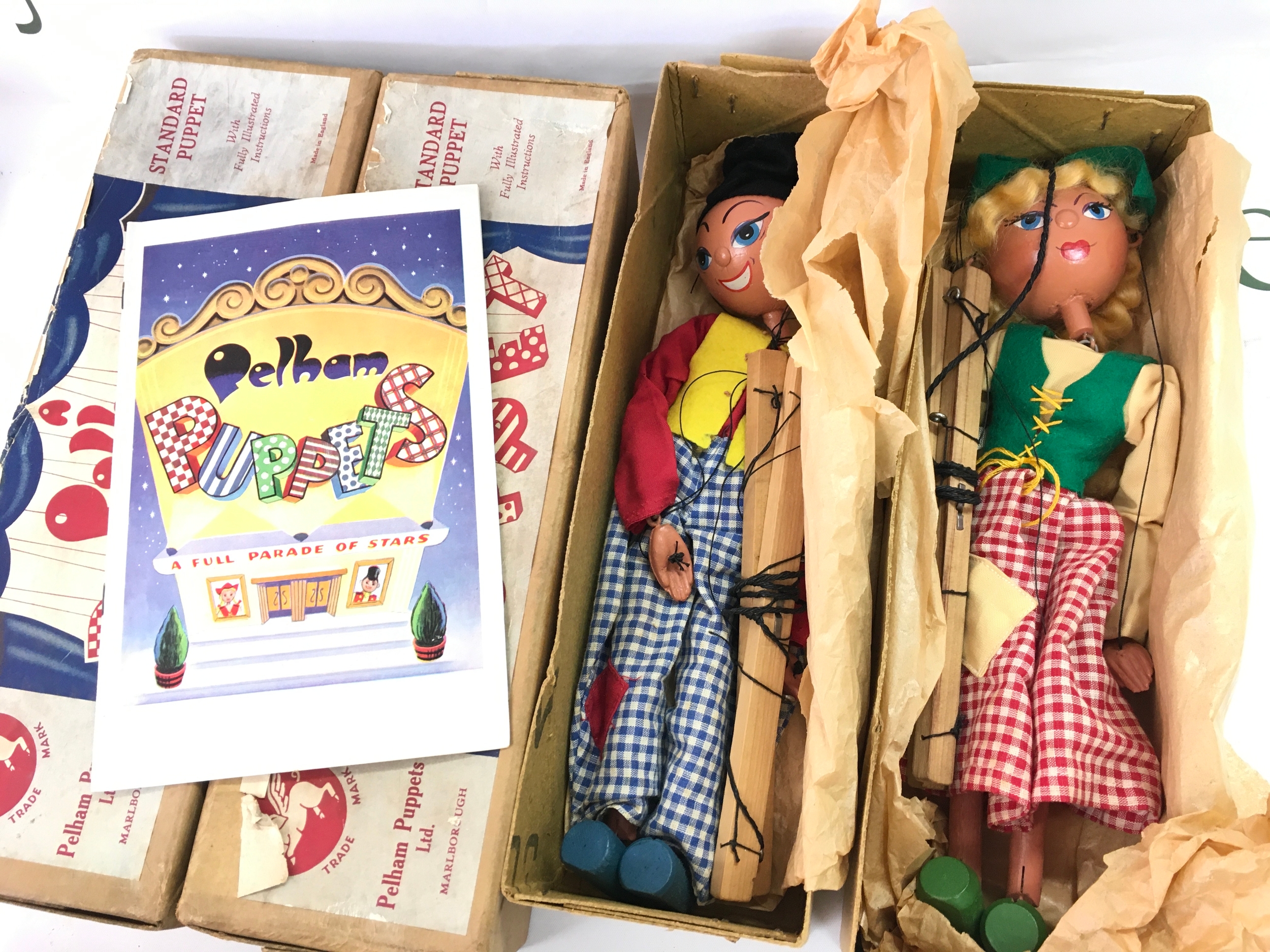 Two boxed Pelham puppets 