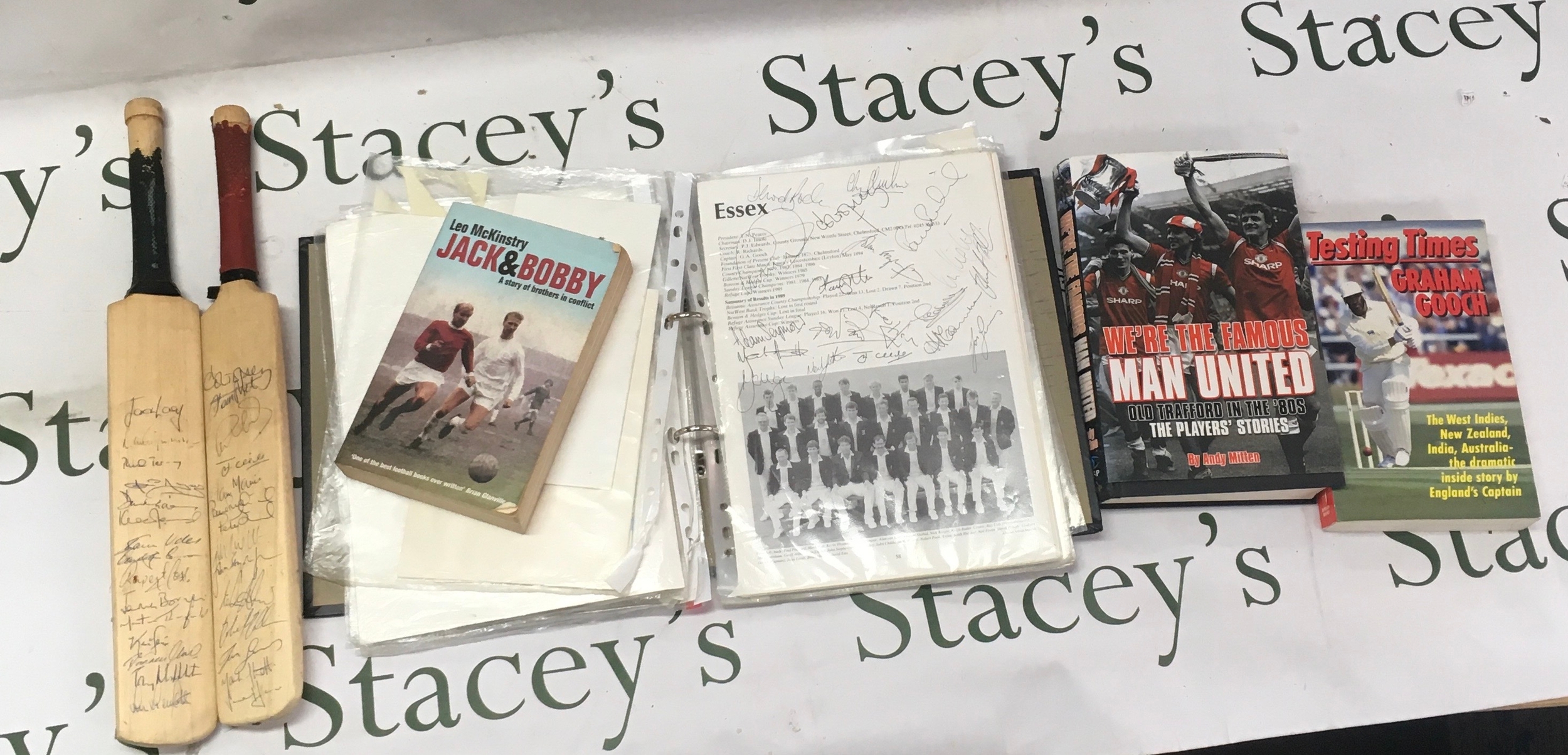 Mixed collection of signed cricket and football memorabilia featuring books, mini cricket bats, etc.