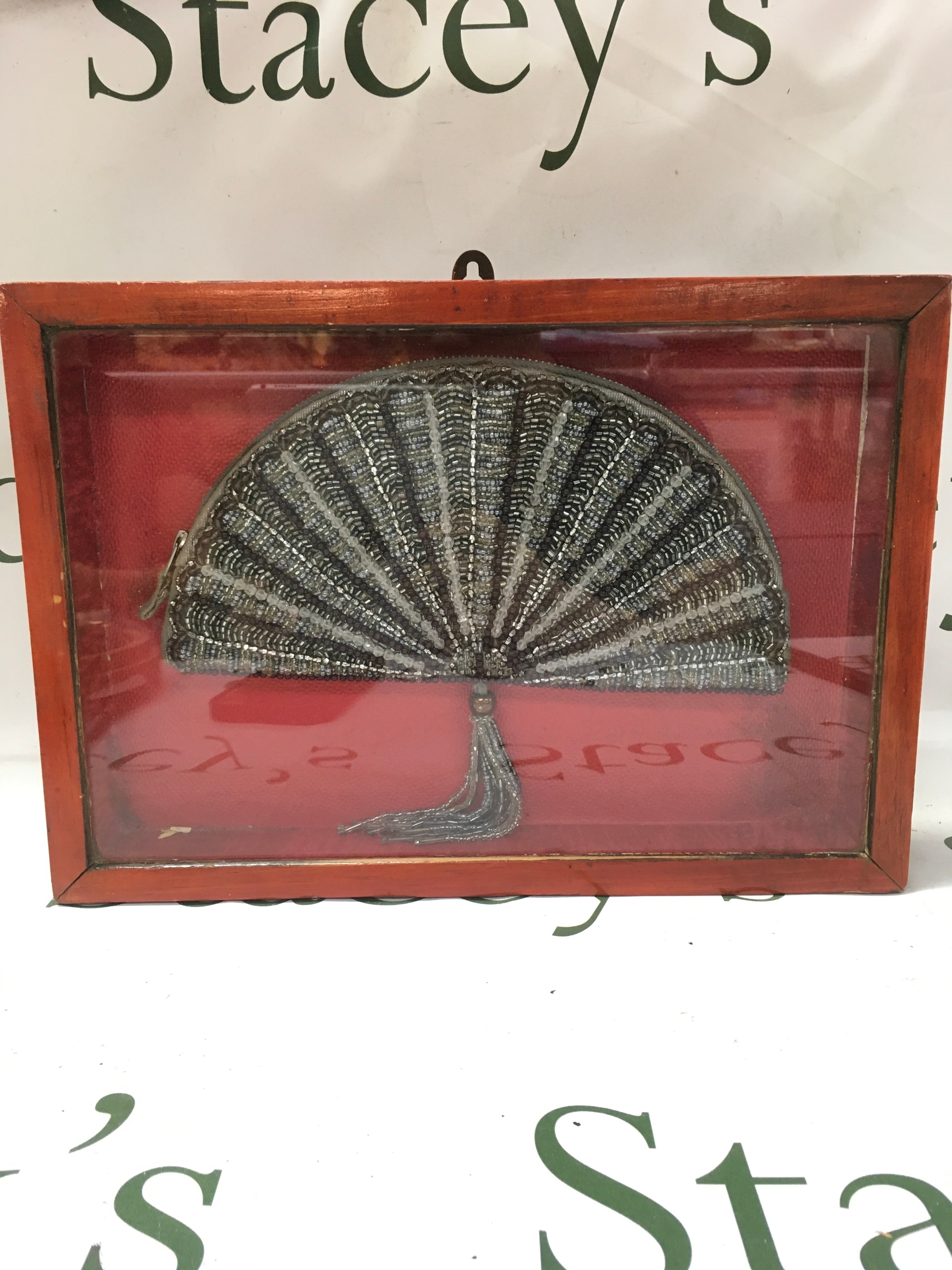 Fan shaped beaded evening bag/clutch.