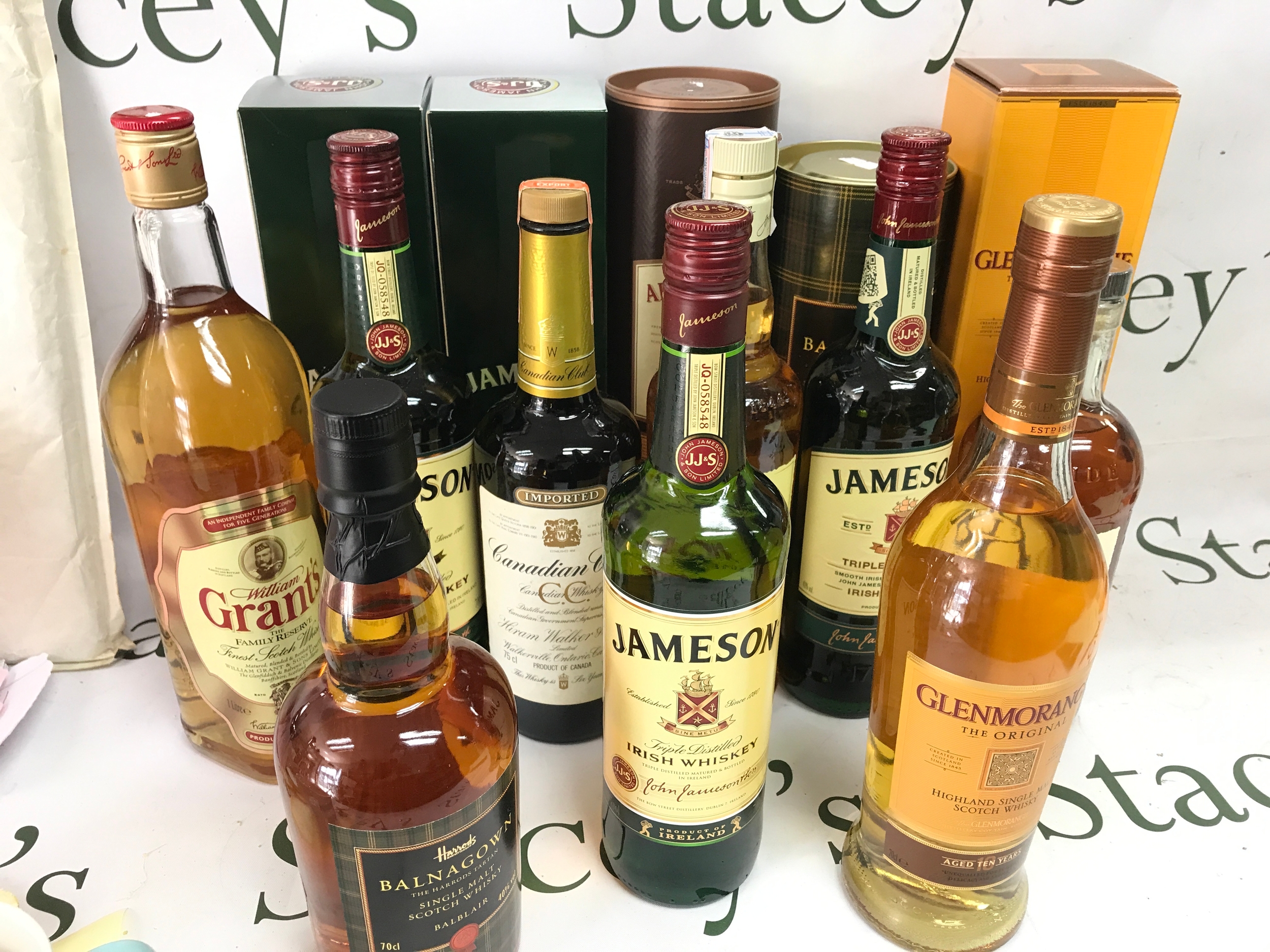 A Collection of Whiskeys including Balnagown, Jameson, Dewar, Copper dog, 