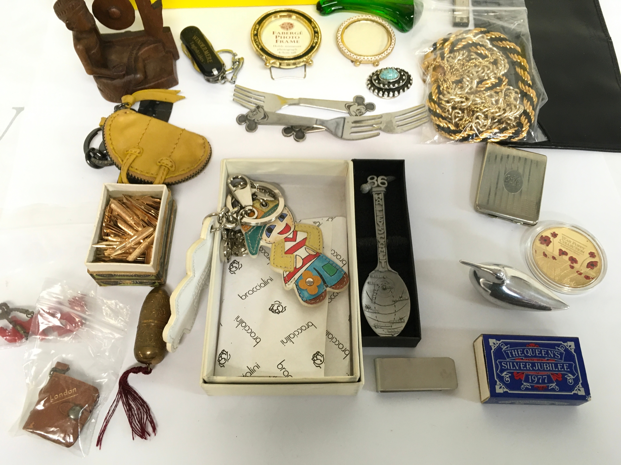 A collection of mixed articles including pen nibs cutlery etc.