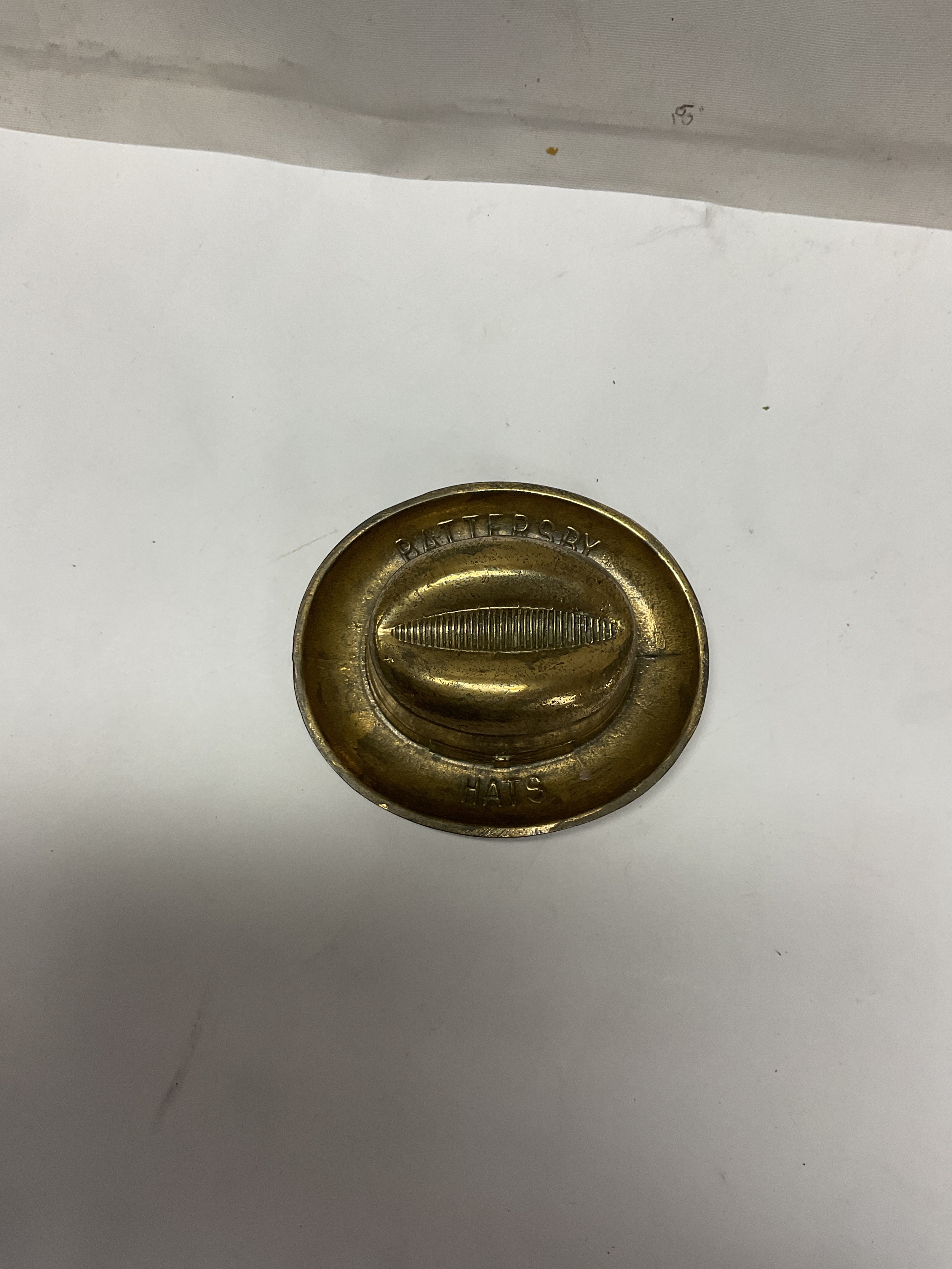 Battersby Hats advertising match strike, in the form of a Homburg hat. W9cm.