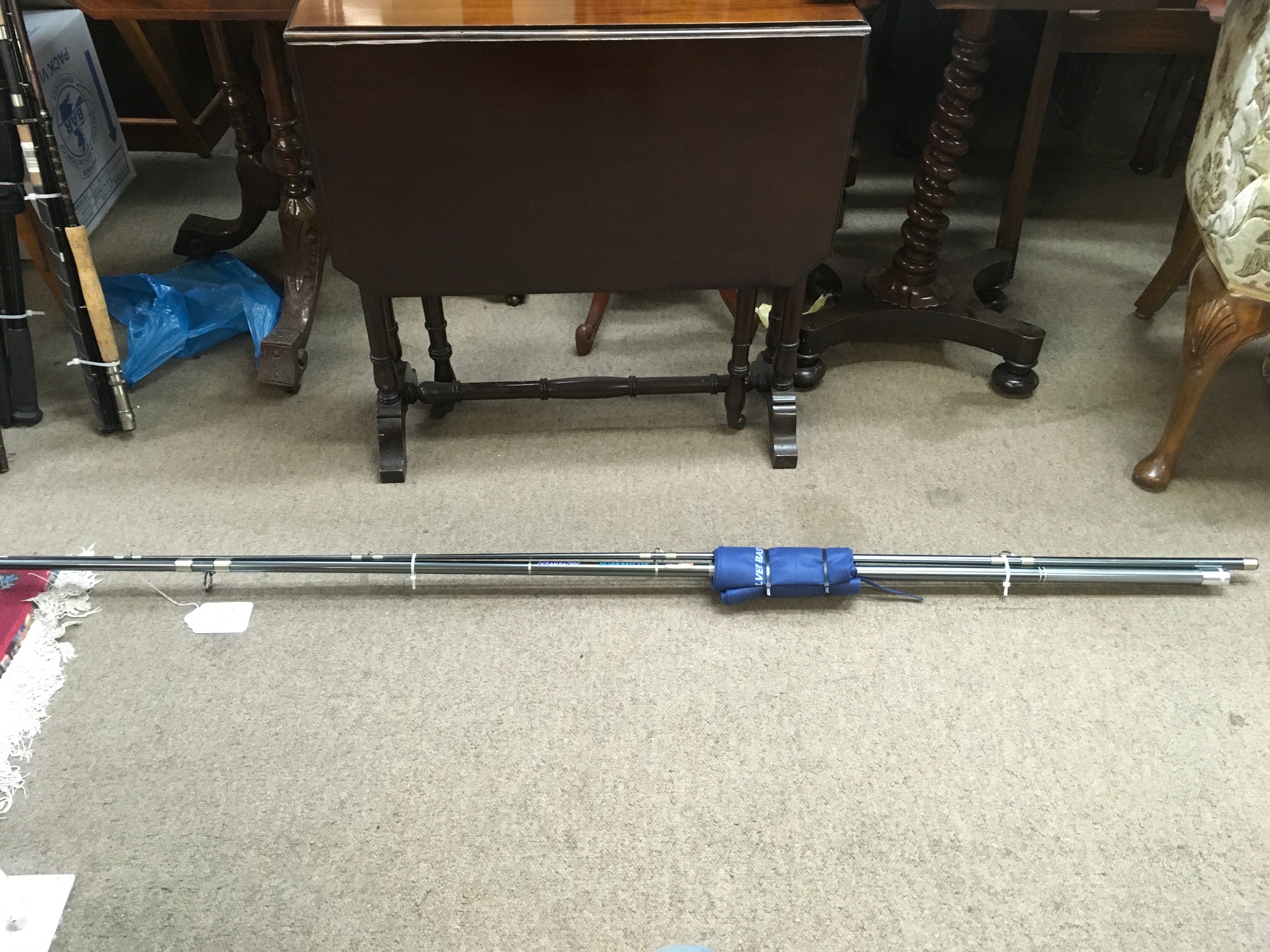 A Fishzone ocean pacific series silver bass 11ft unused rod. No reserve 