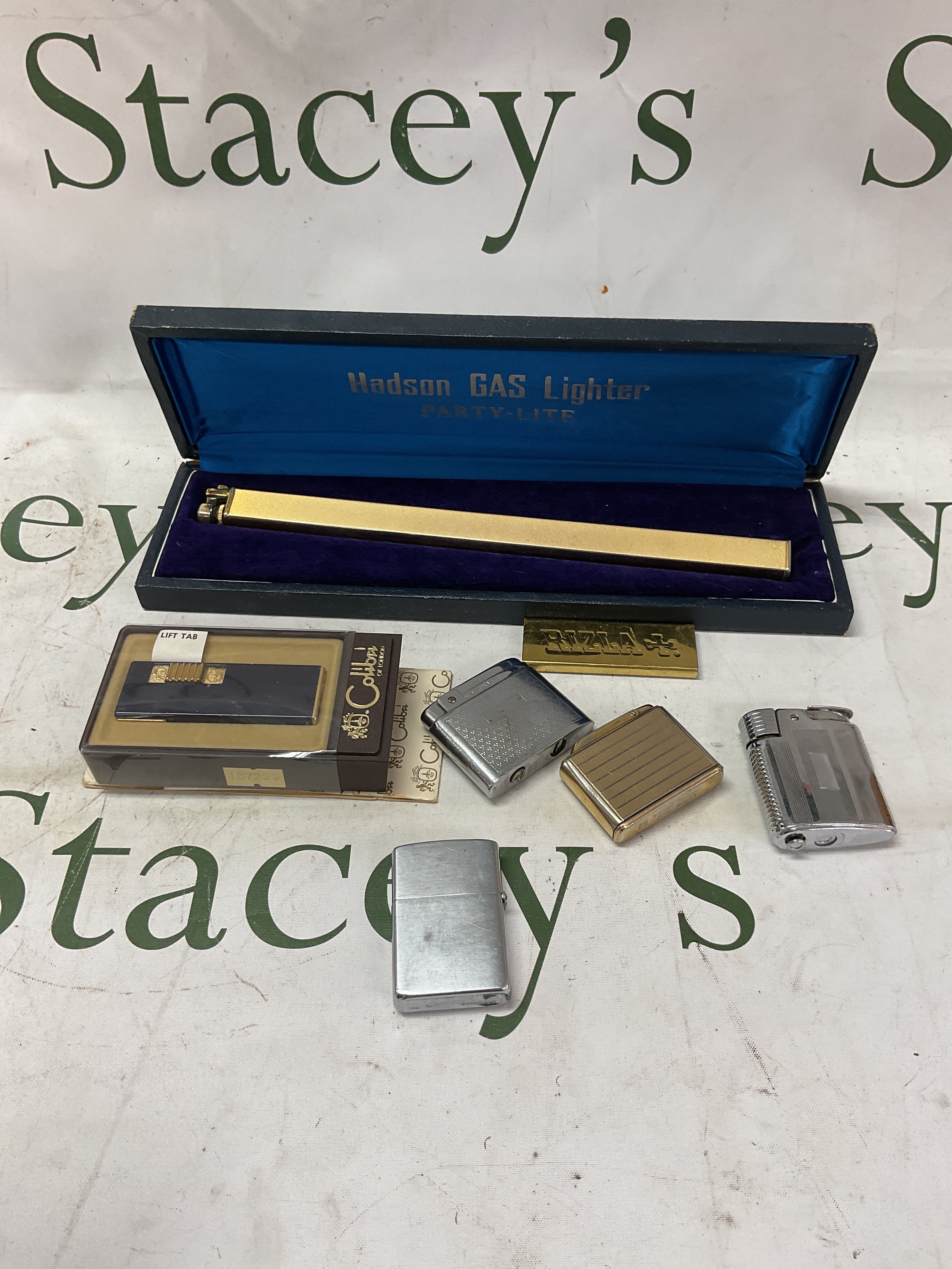 Qty of lighters, Zippo, Colibri, Ronson and Hudson Party-lite.