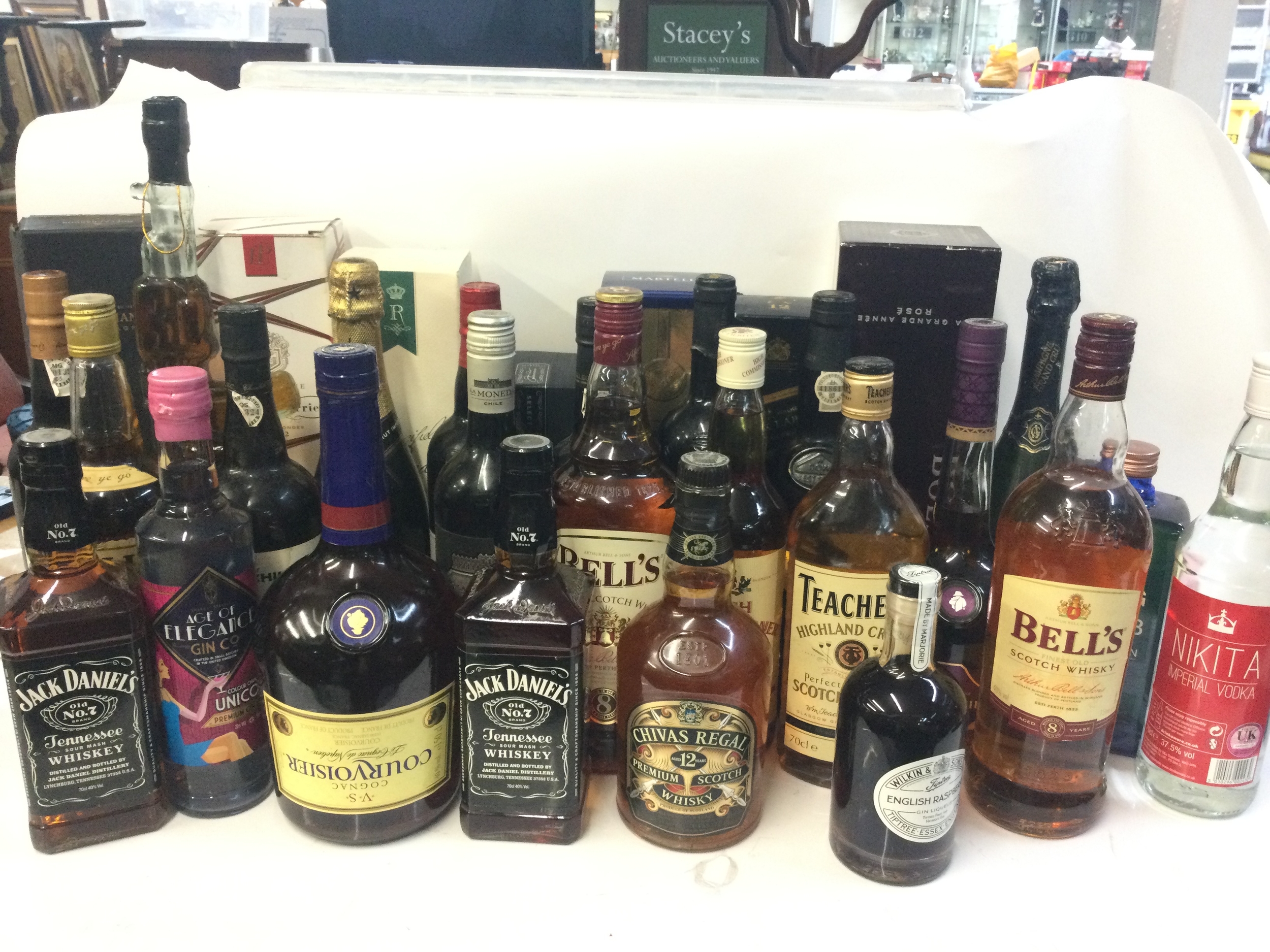 A collection of spirits and whiskeys including jack Daniels, Chivas regal, Haig club etc. 