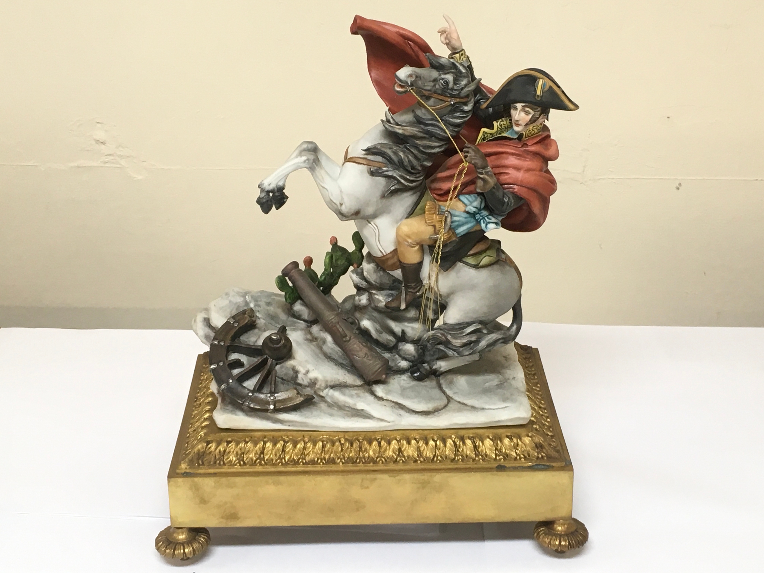 Capodimonte Napoleon Bonaparte on horseback by Bruno Tyche. ( on brass base)