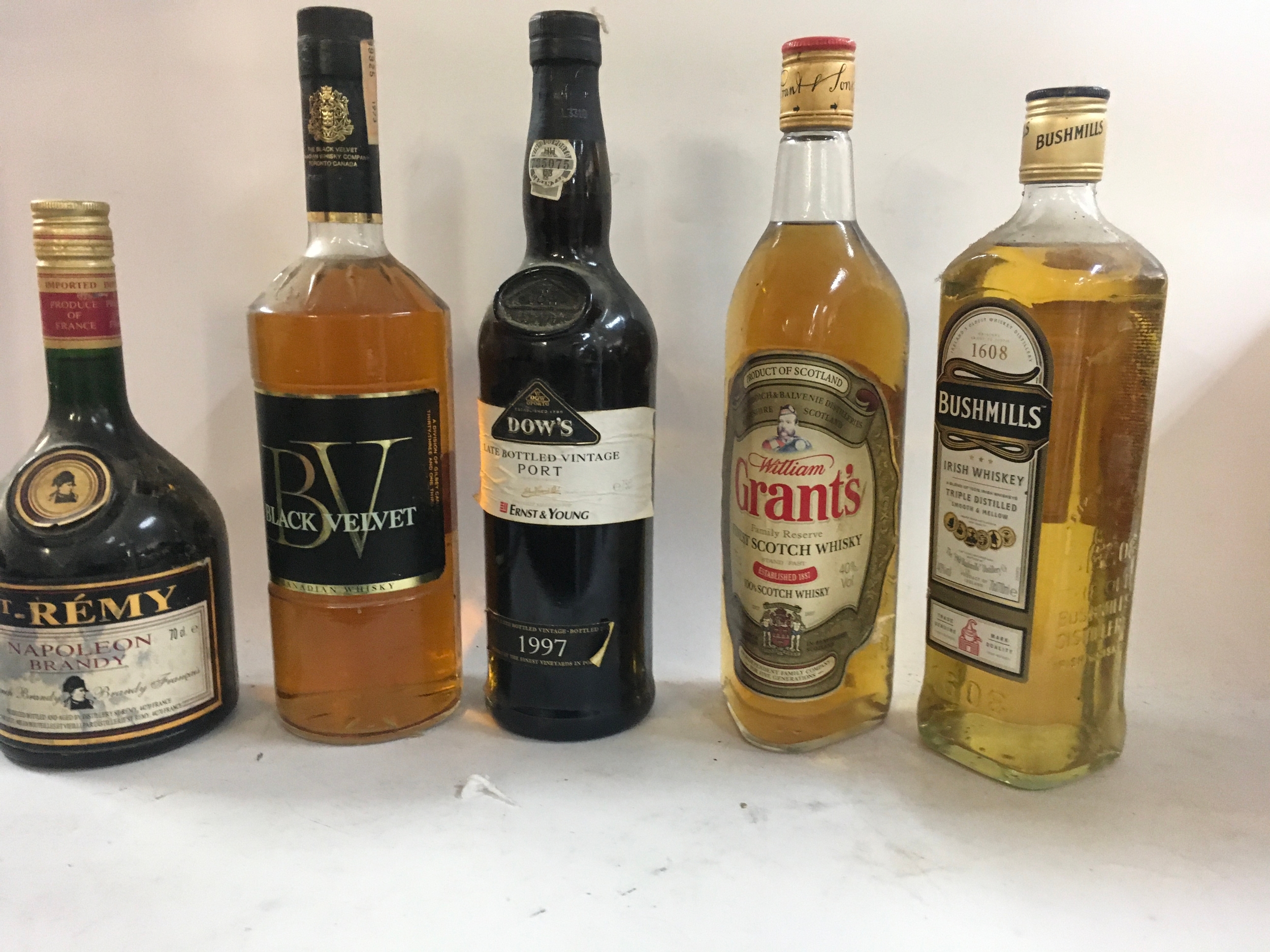 1977 vintage, port grants, scotch whiskey bush mills, BV black velvet (1673) Napoleon brandy.