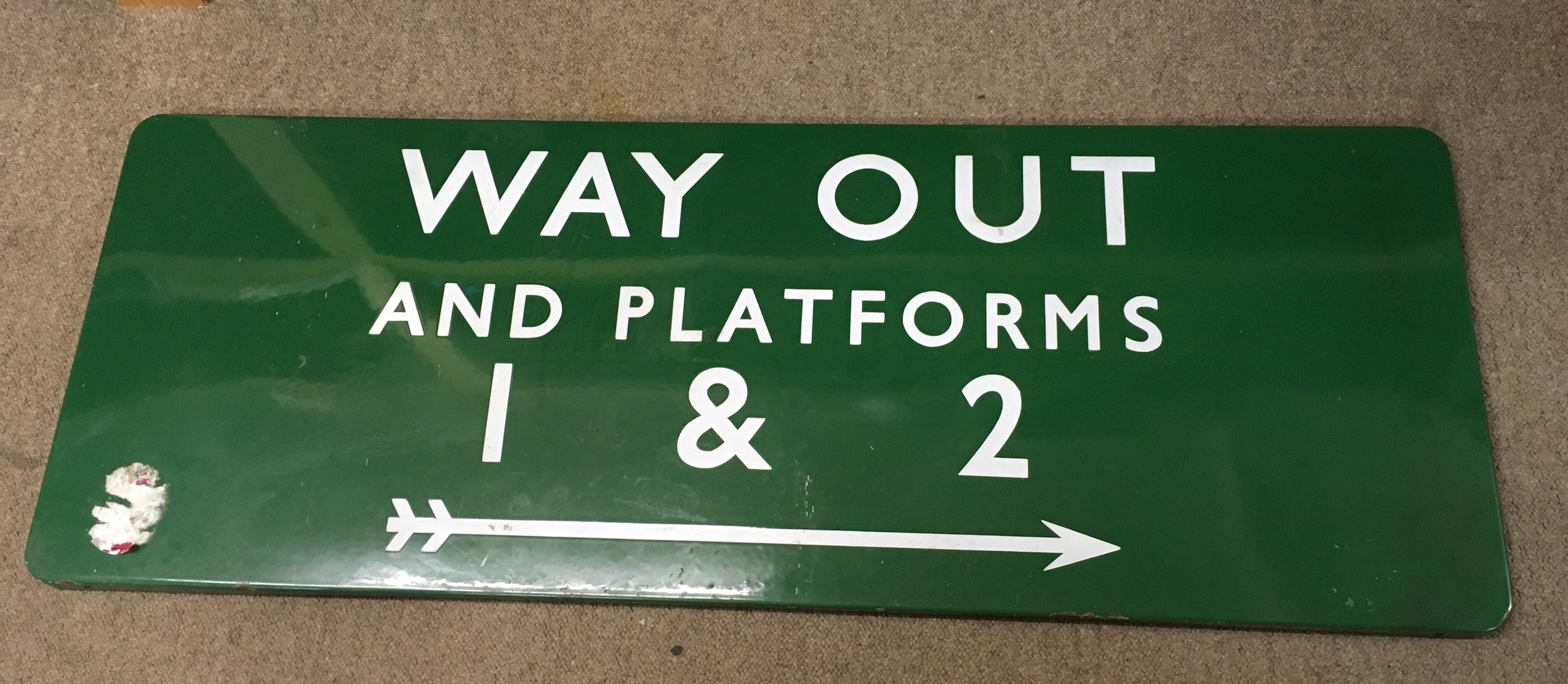 A Green enamel railway sign , way out platform 1+2 . 46x122cm 
