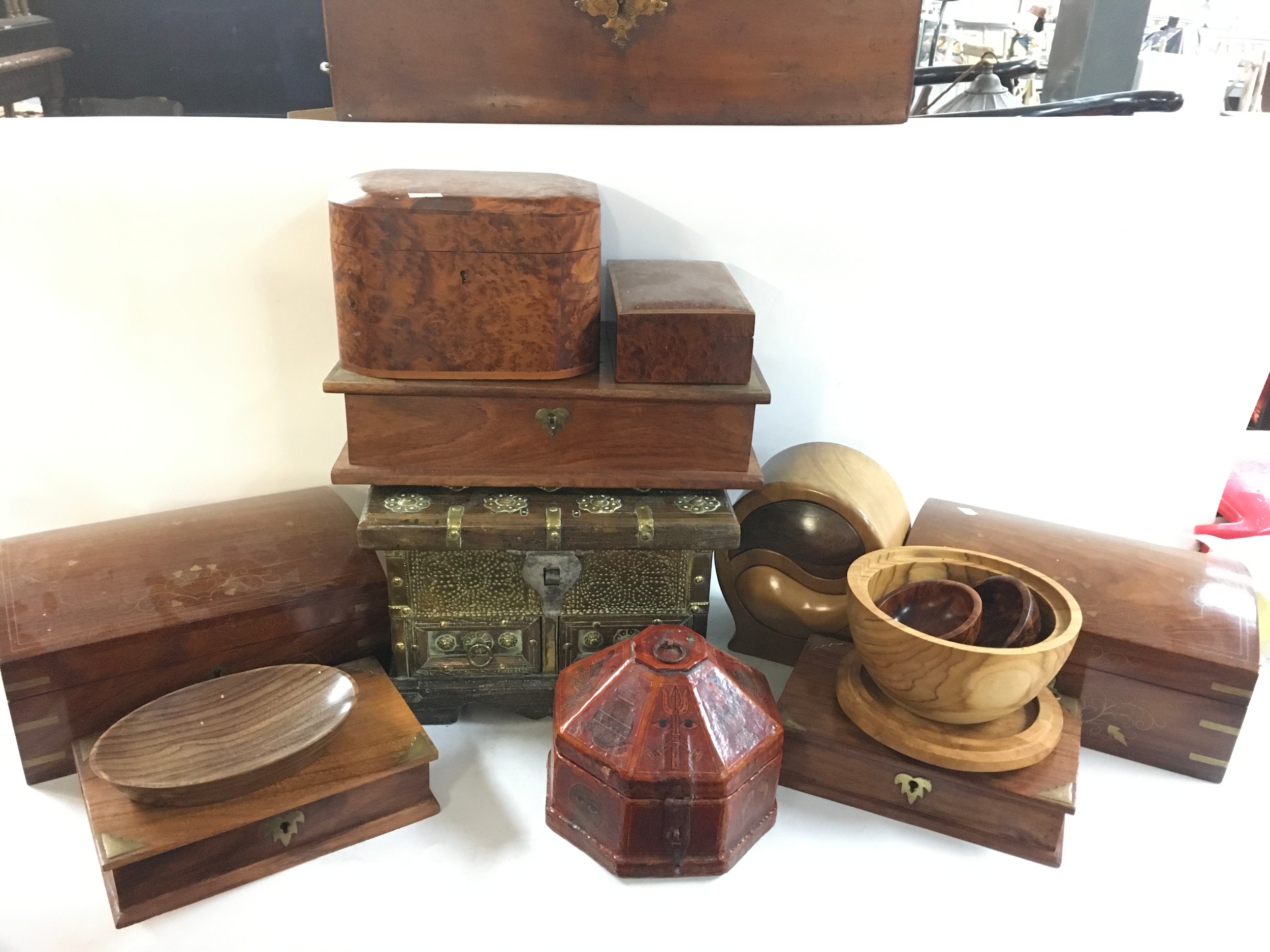 A collection of hard wood boxes 