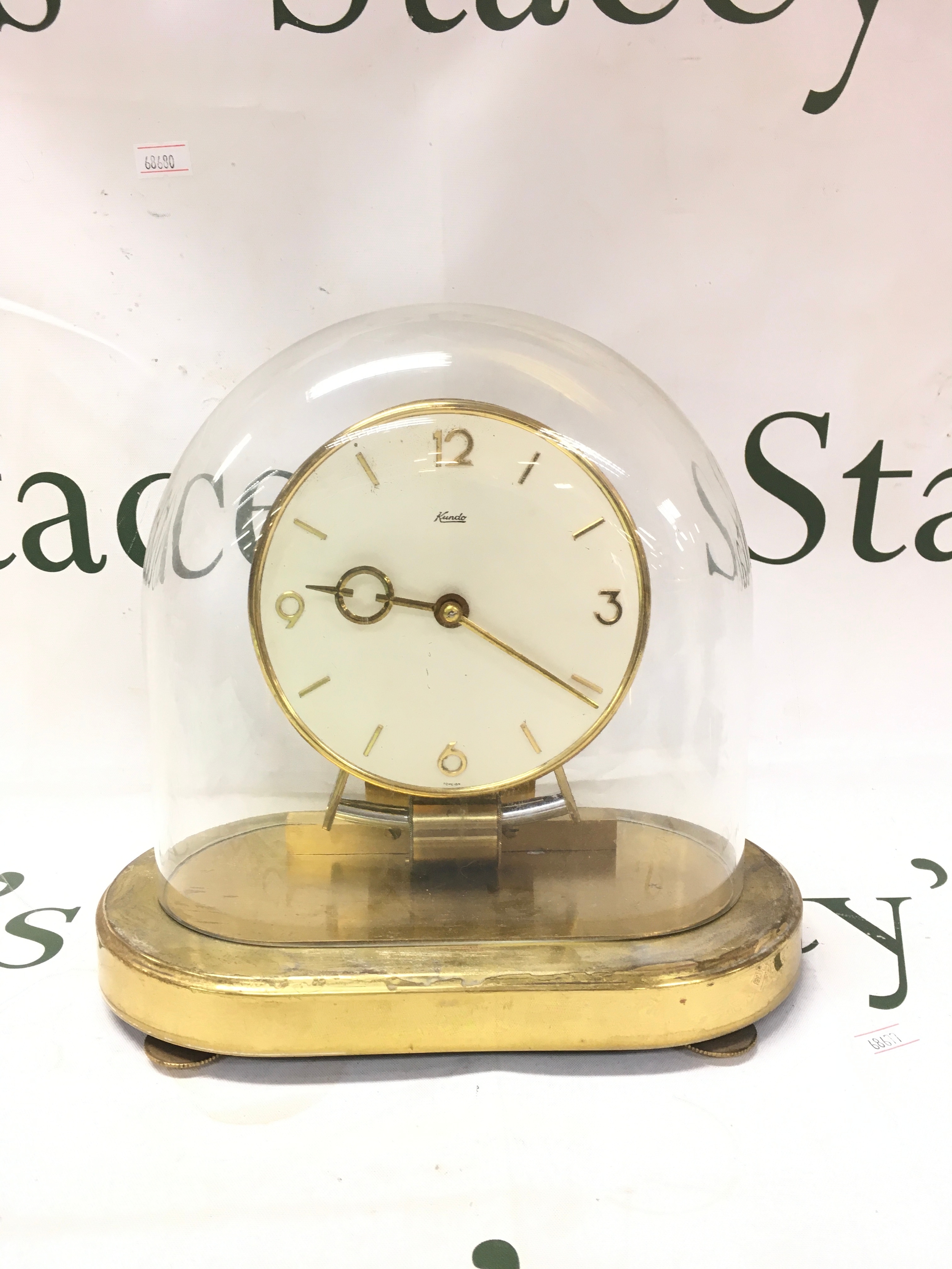 A German clock under a glass dome