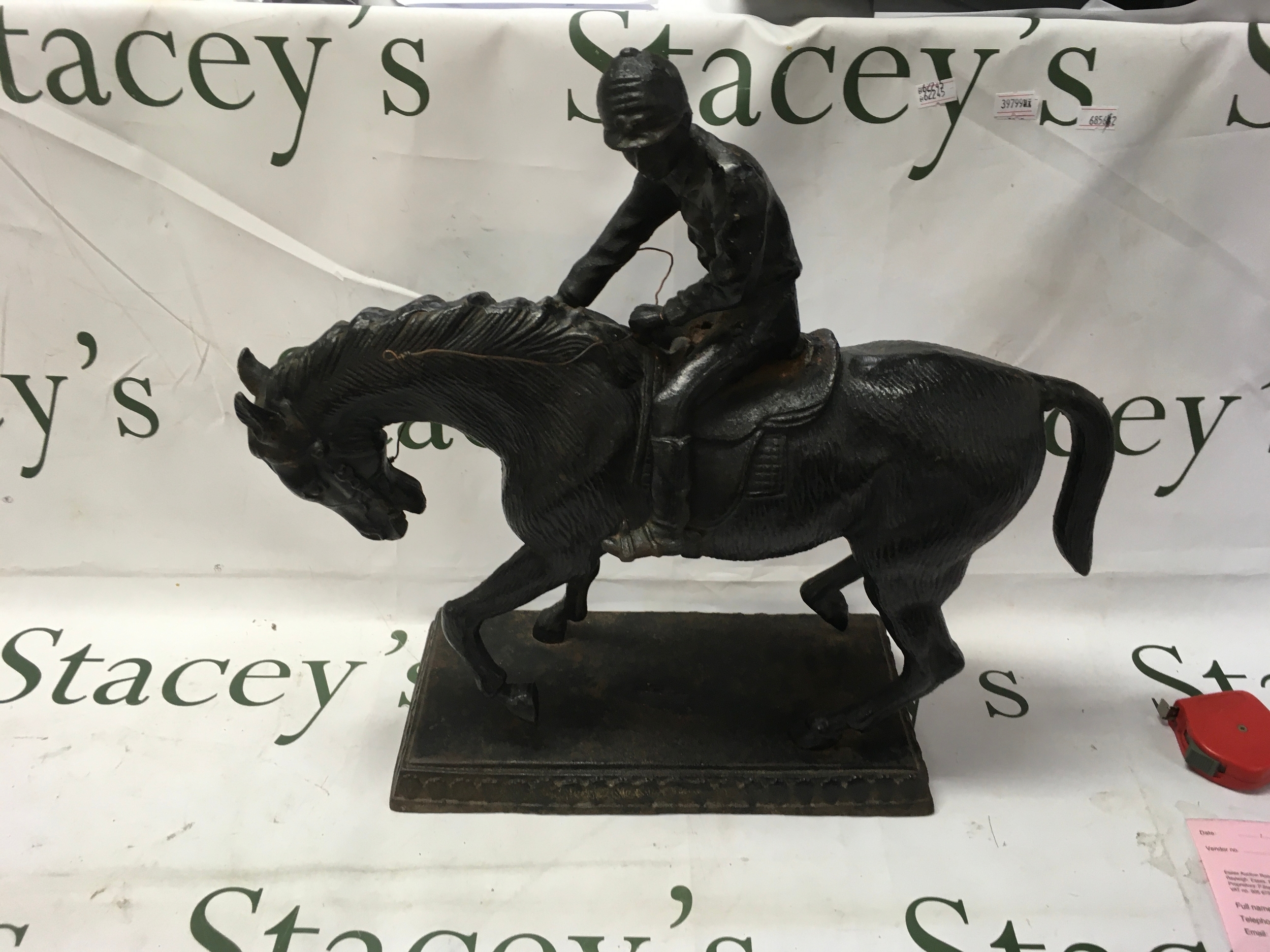 Large cast iron racehorse and jockey, 40 cm x 44cm