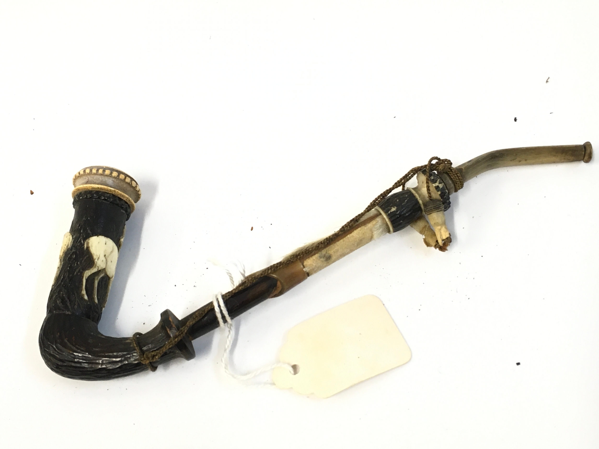 An Austrian tobacco pipe with deer design ,16cm long