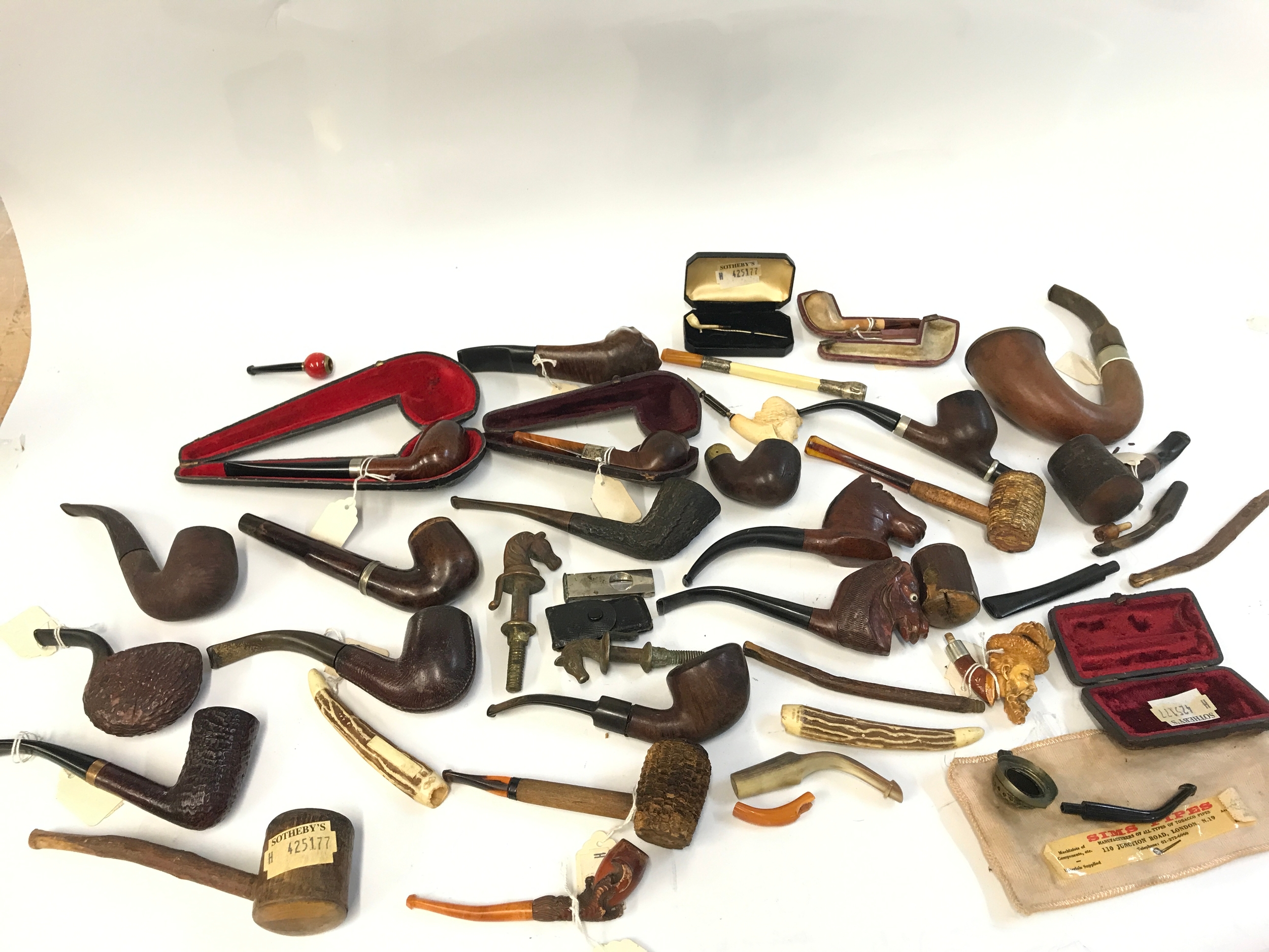A Collection of vintage smoking pipes 